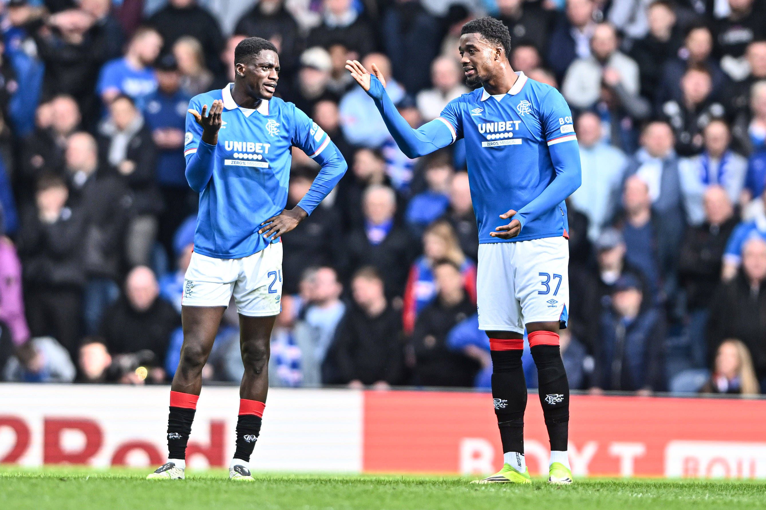 Nasser Djiga and Emmanuel Fernandez of Rangers