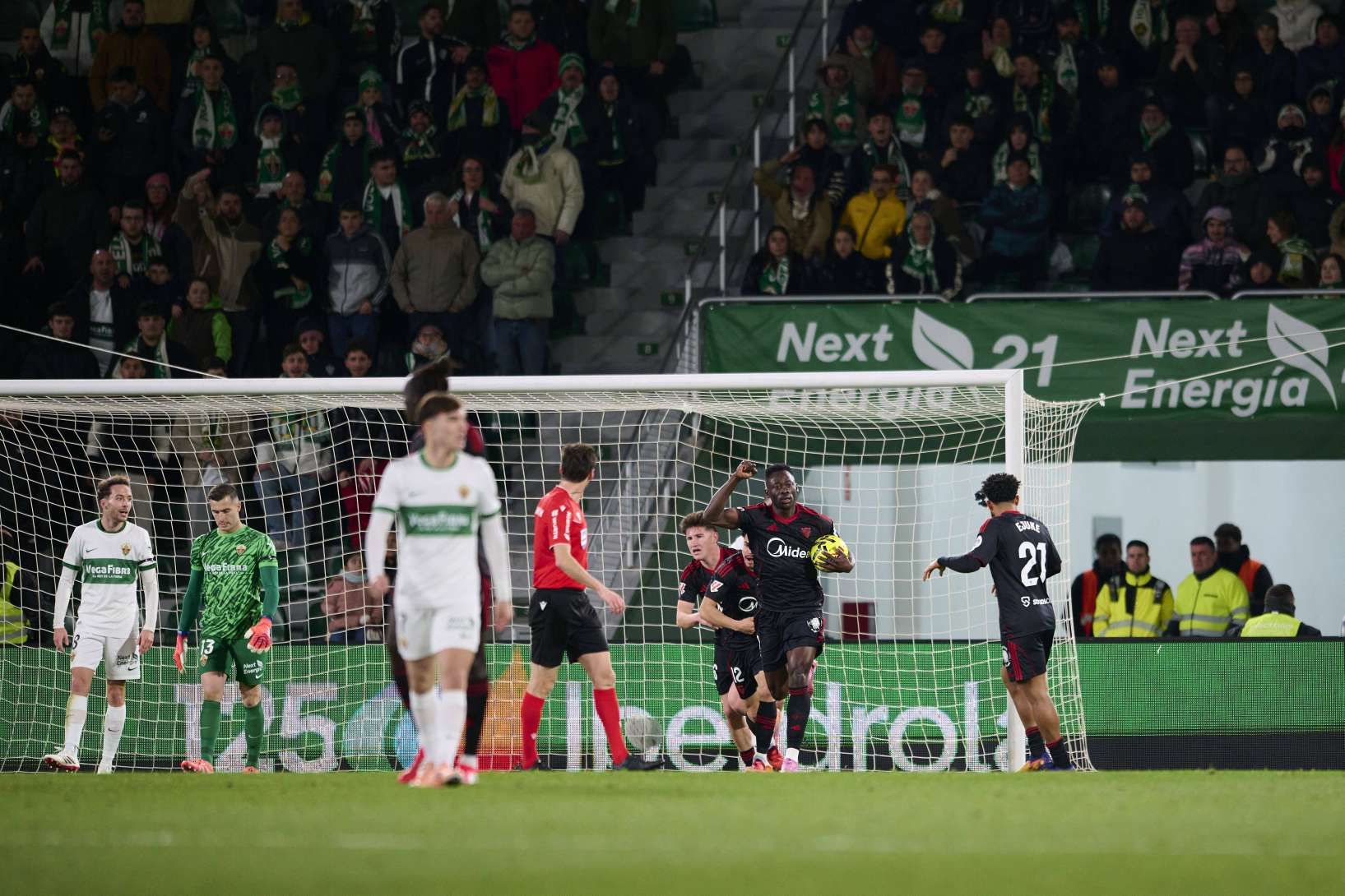 Akor Adams celebrates after scoring for Sevilla against Elche