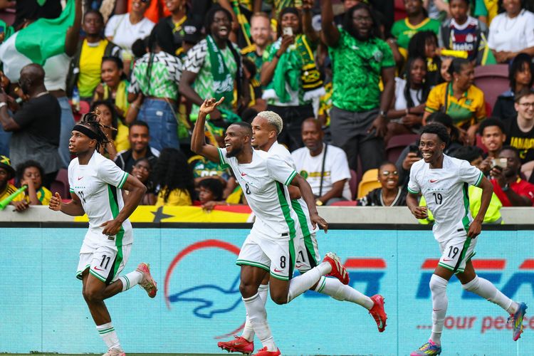 Super Eagles stars Samuel Chukwueze, Sodiq Ismail, Nathan Tella celebrating a goal