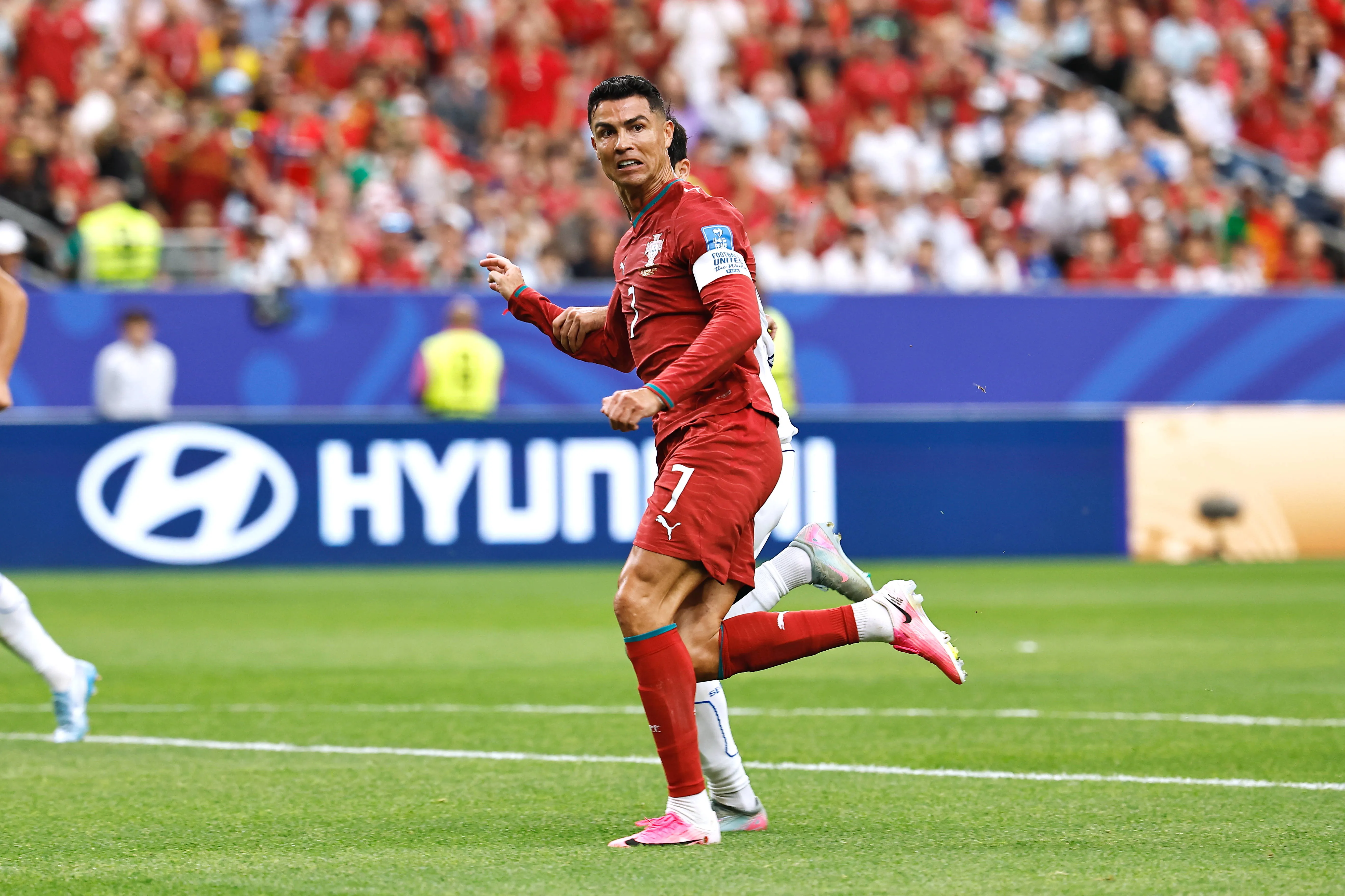 Cristiano Ronaldo scores in the FIFA World Cup match between Portugal and Uzbekistan at the Houston Stadium in United States