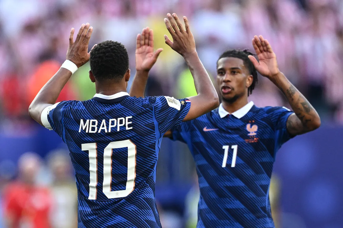 Kylian Mbappe and Michael Olise
