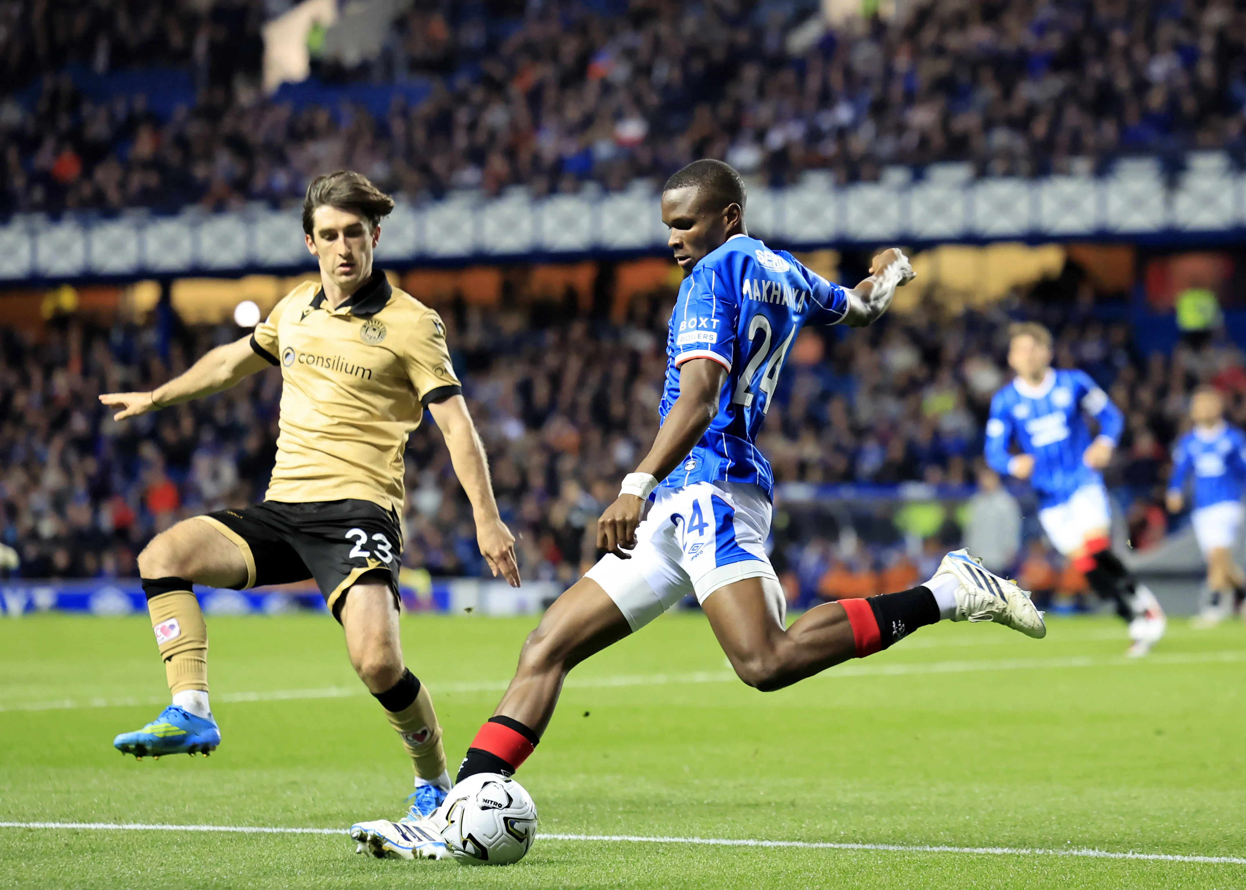 Olwethu Makhanya of Rangers clears the ball