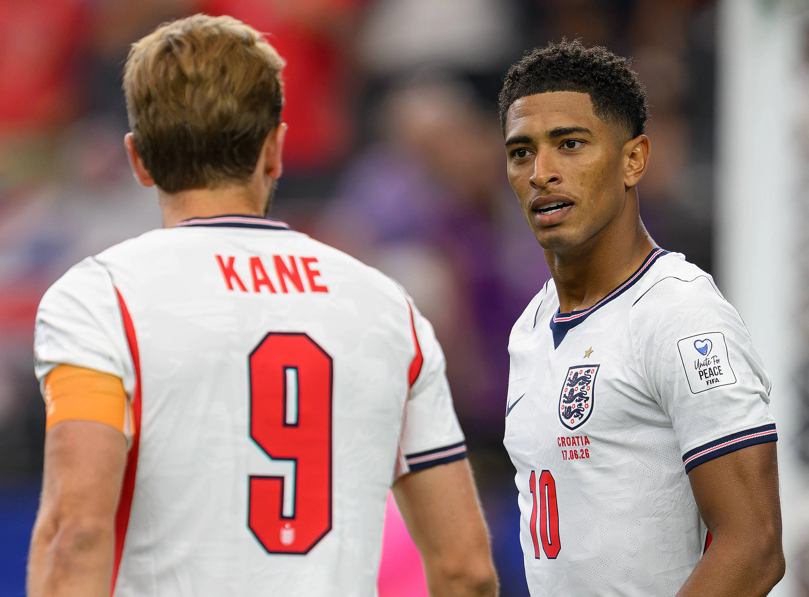 England players Jude Bellingham and Harry Kane exchange words