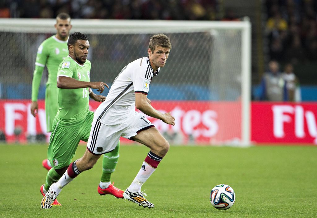 Estadio Beira-Rio: Thomas Müller and El Arbi Hillel Soudani in action as Germany took on Algeria