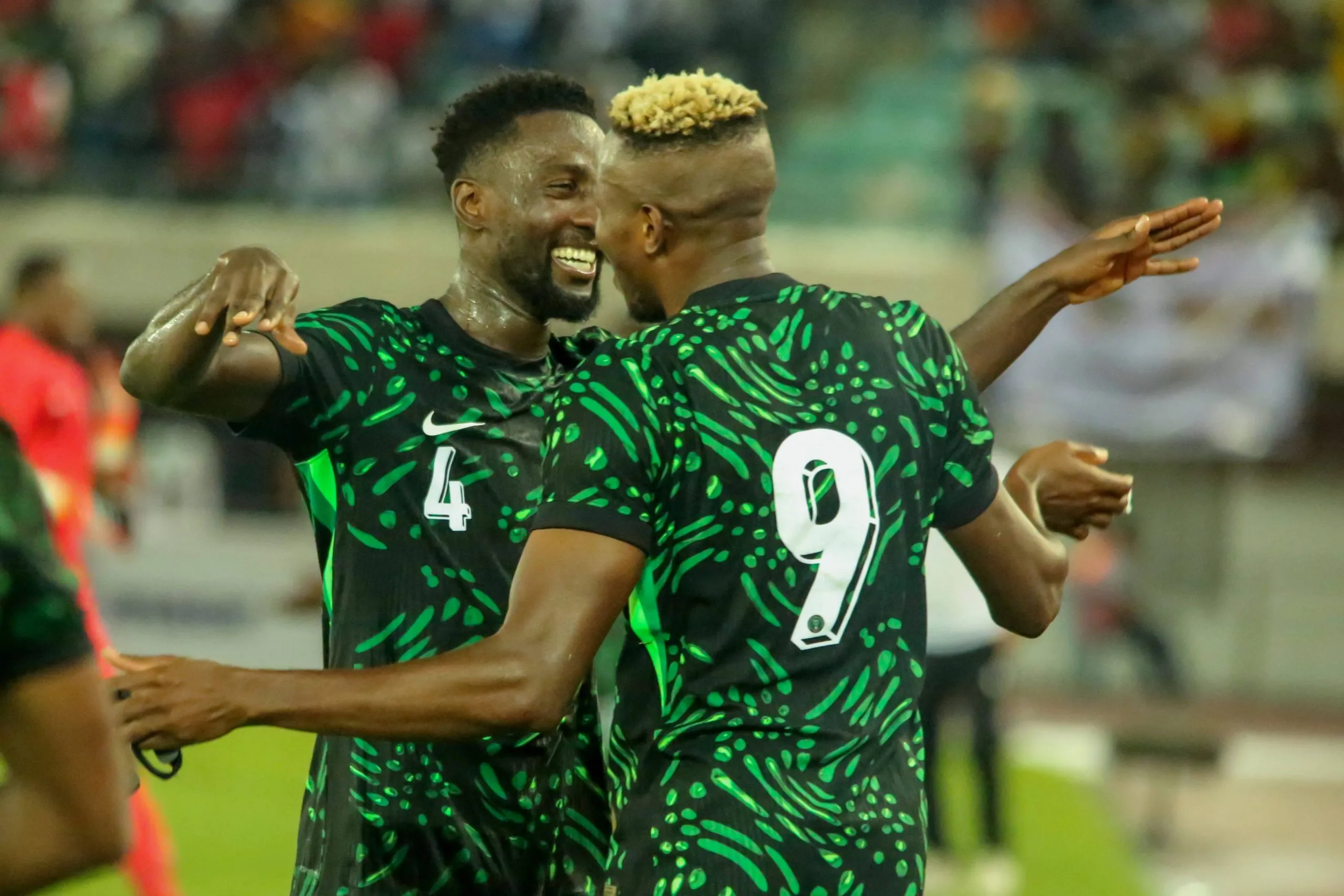 Nigeria Super Eagles and Galatasaray forward Victor Osimhen hugs Wilfred Ndidi.