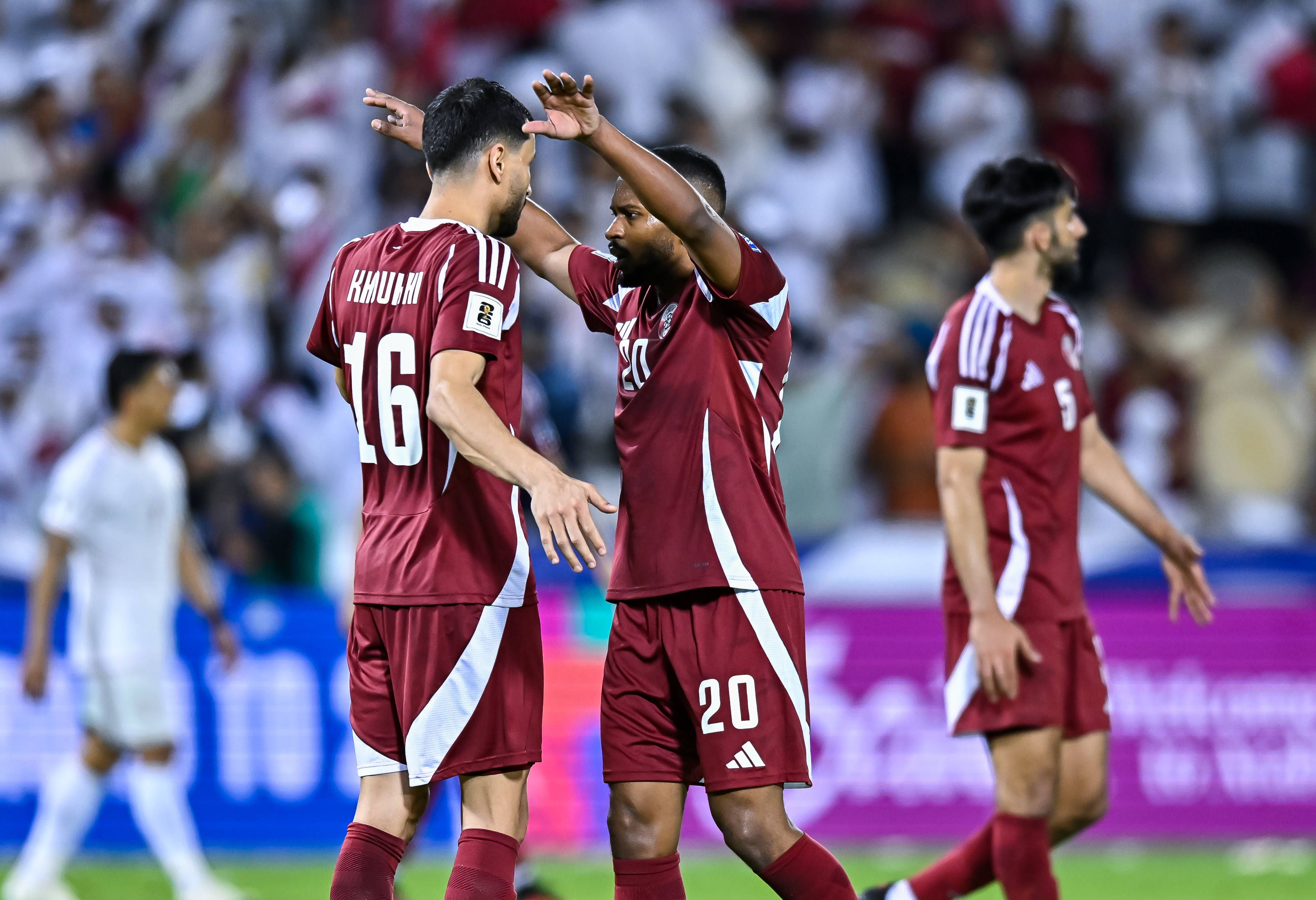 Boualem Khoukhi and Ahmed Fathy of Qatar recat after winning the FIFA World Cup 2026 AFC Asian Qualifiers group A third round match between Qatar and Iran