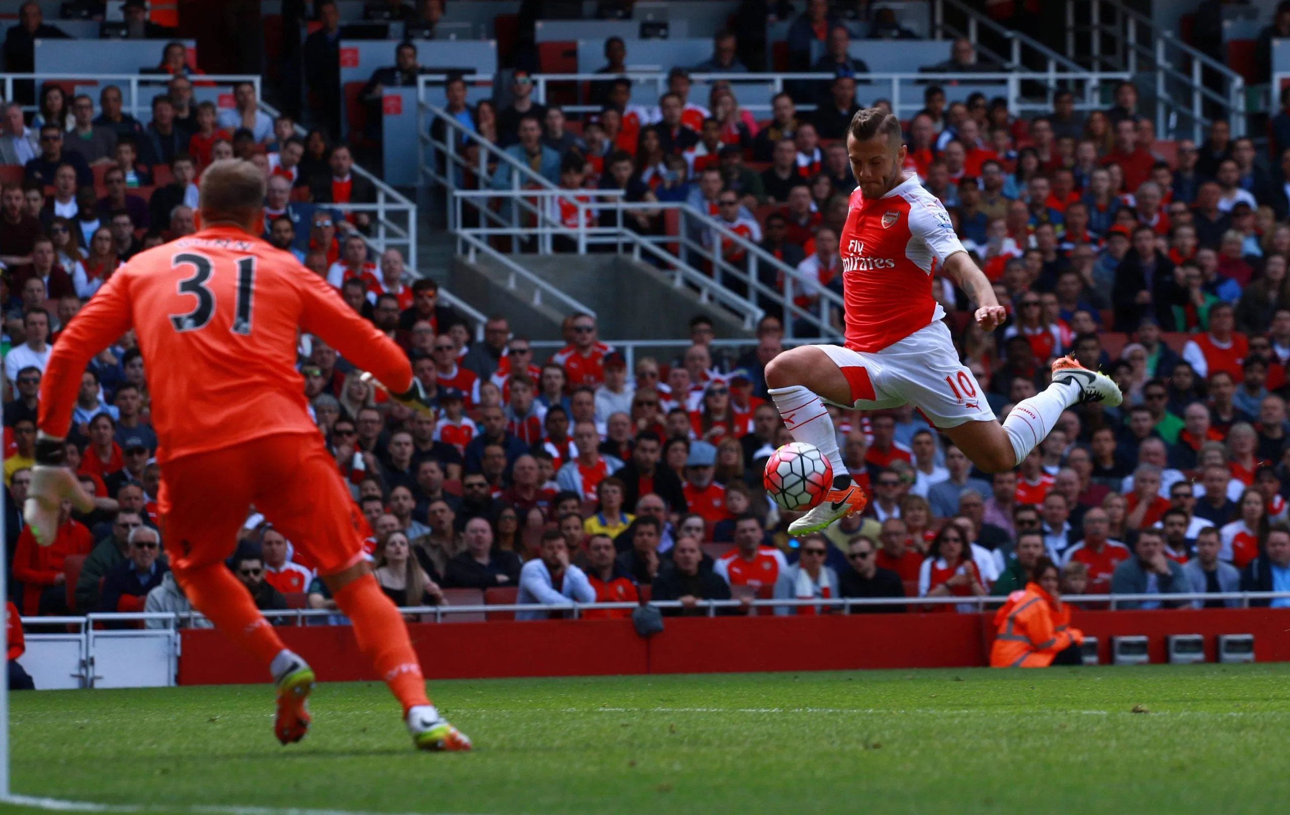 Jack Wilshere fires in a shot during a game for Arsenal