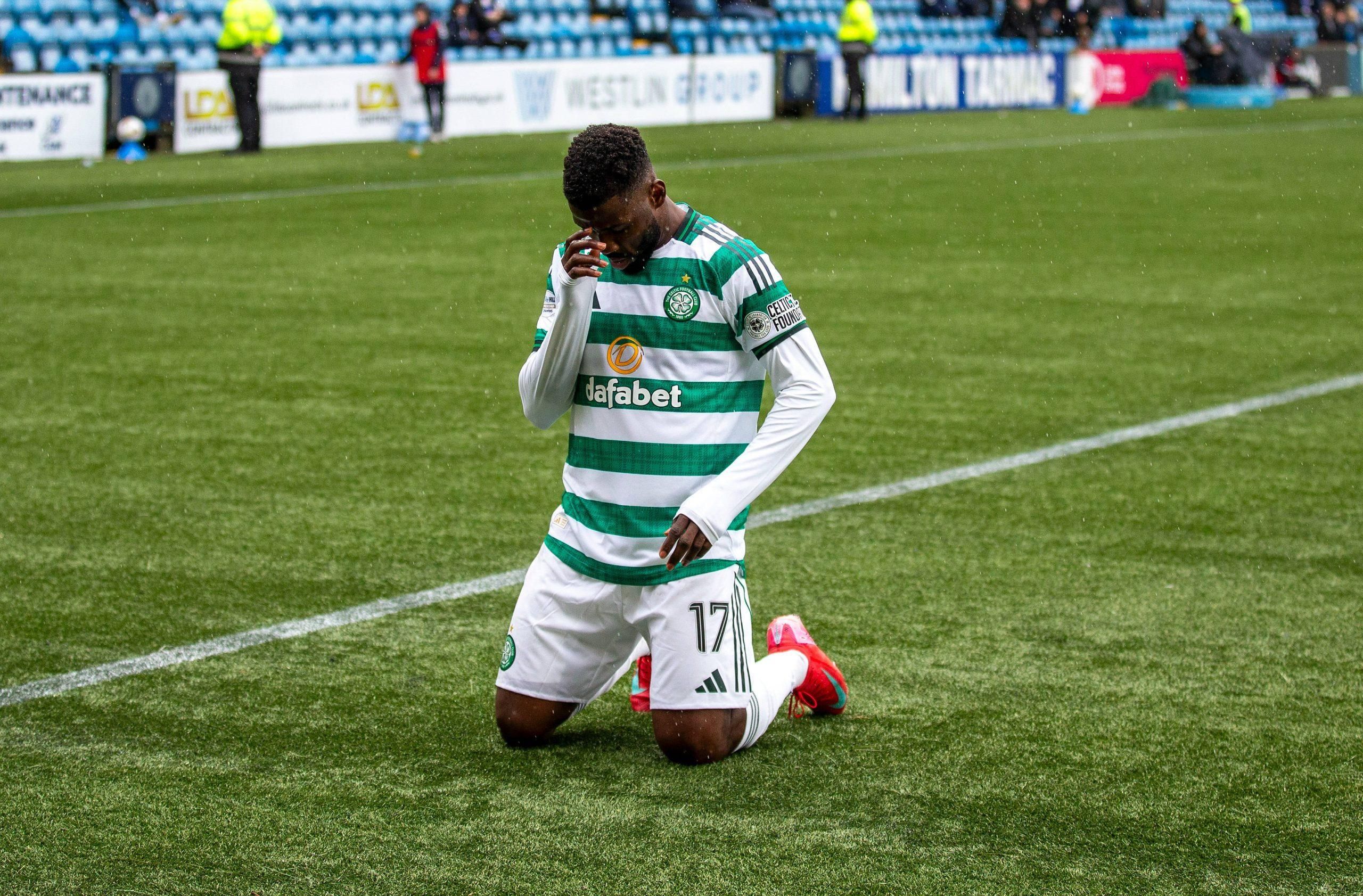 Kelechi Iheanacho of Celtic celebrates after he makes it 2-1 to Celtic from the penalty spot after a VAR check in the 96th minute