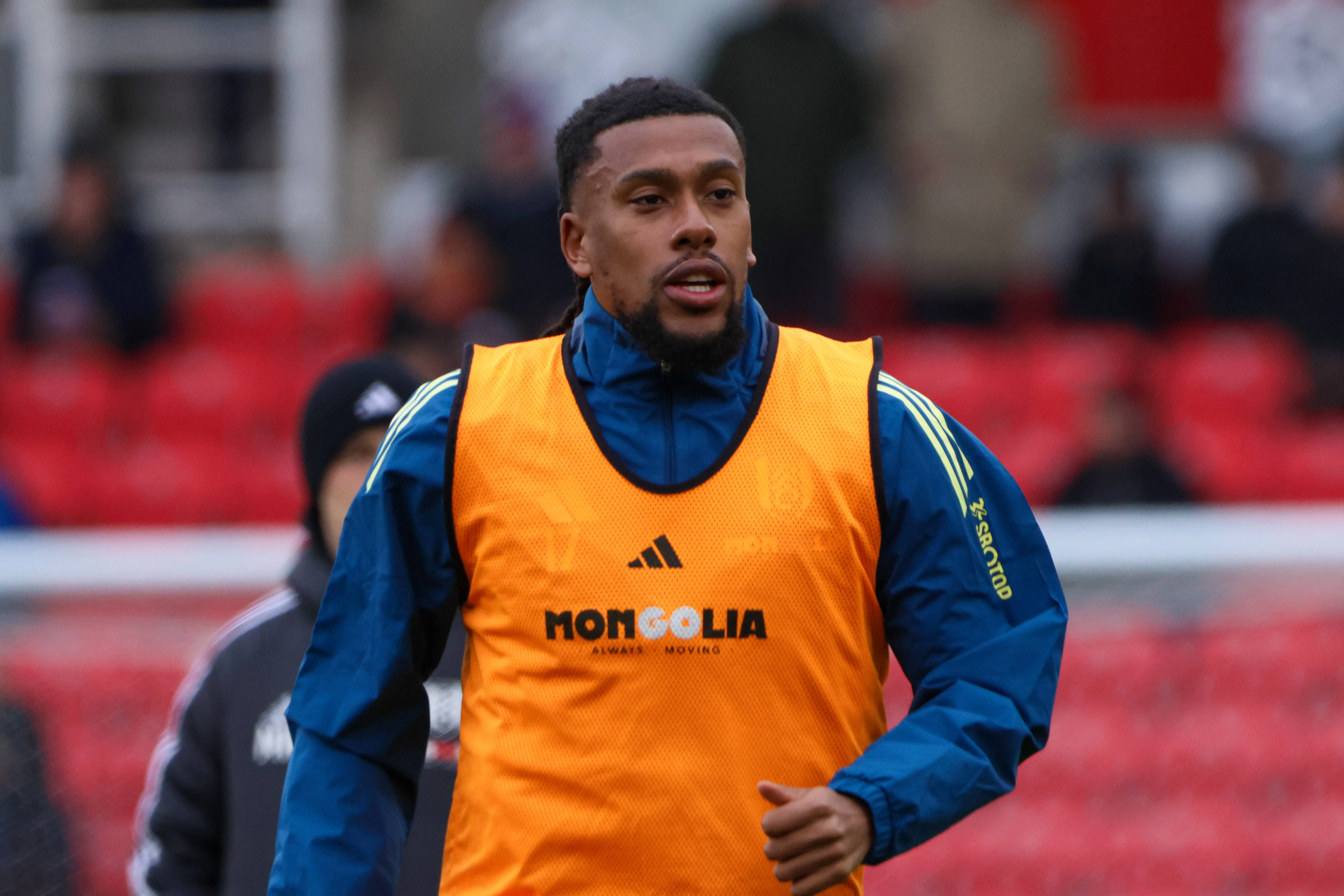 Alex Iwobi warming up before match against Stoke City - Emirates FA Cup Fourth Round