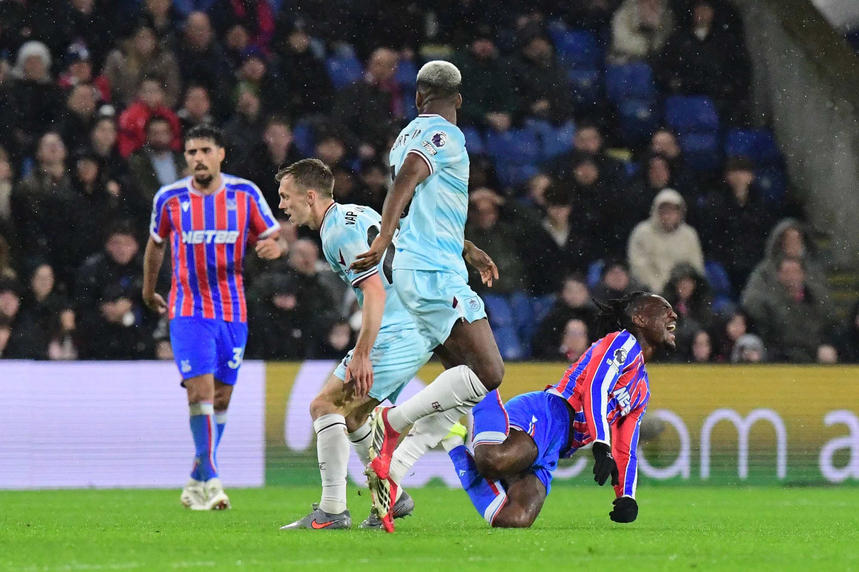 Christantus Uche Midfielder of Crystal Palace goes to ground