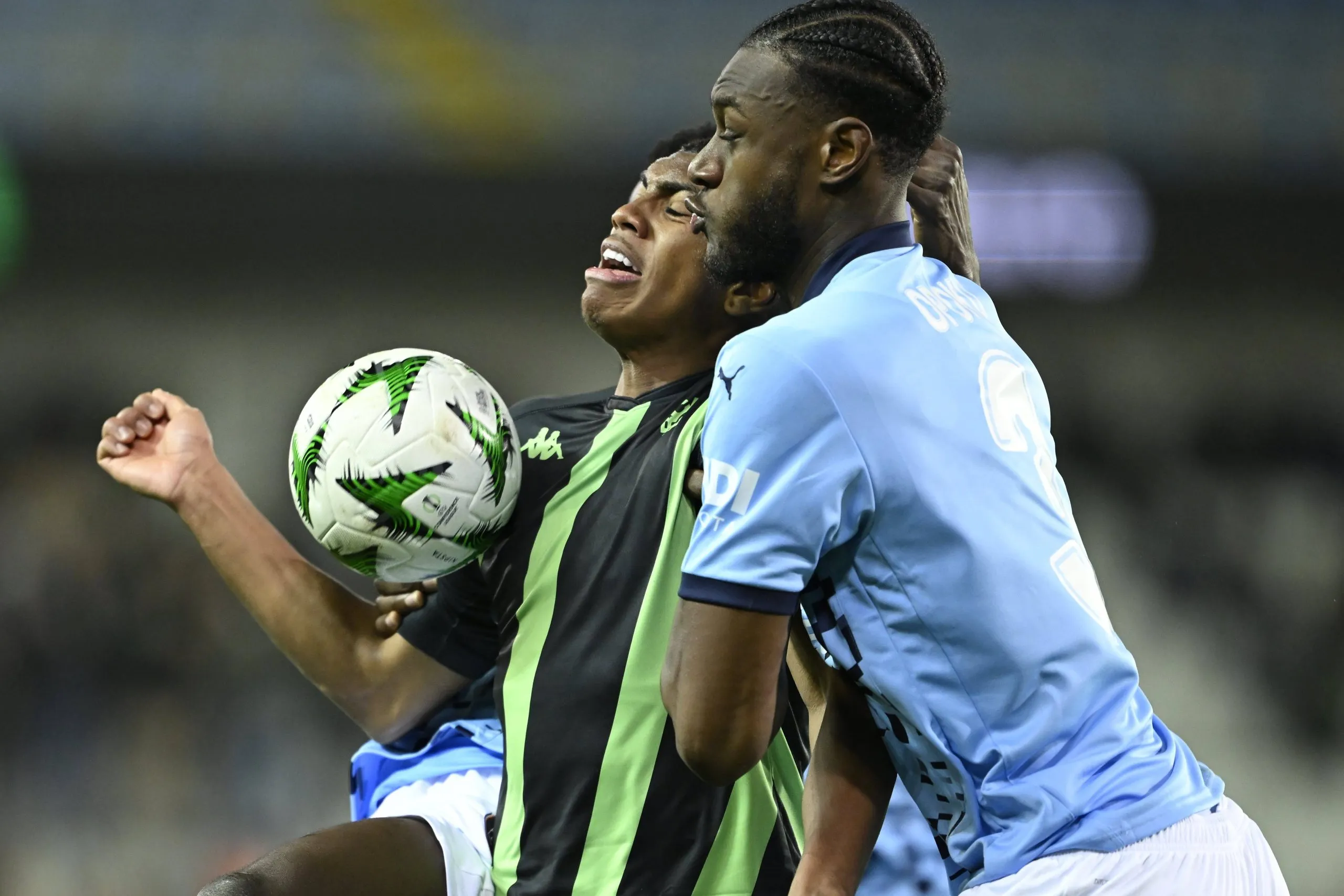 Augusto Da Silva Felipe forward of Cercle Brugge in duel with Opoku Jerome defender of Basaksehir during the UEFA Conference League 2024/25 League Phase MD6 match between Cercle Brugge and Basaksehir