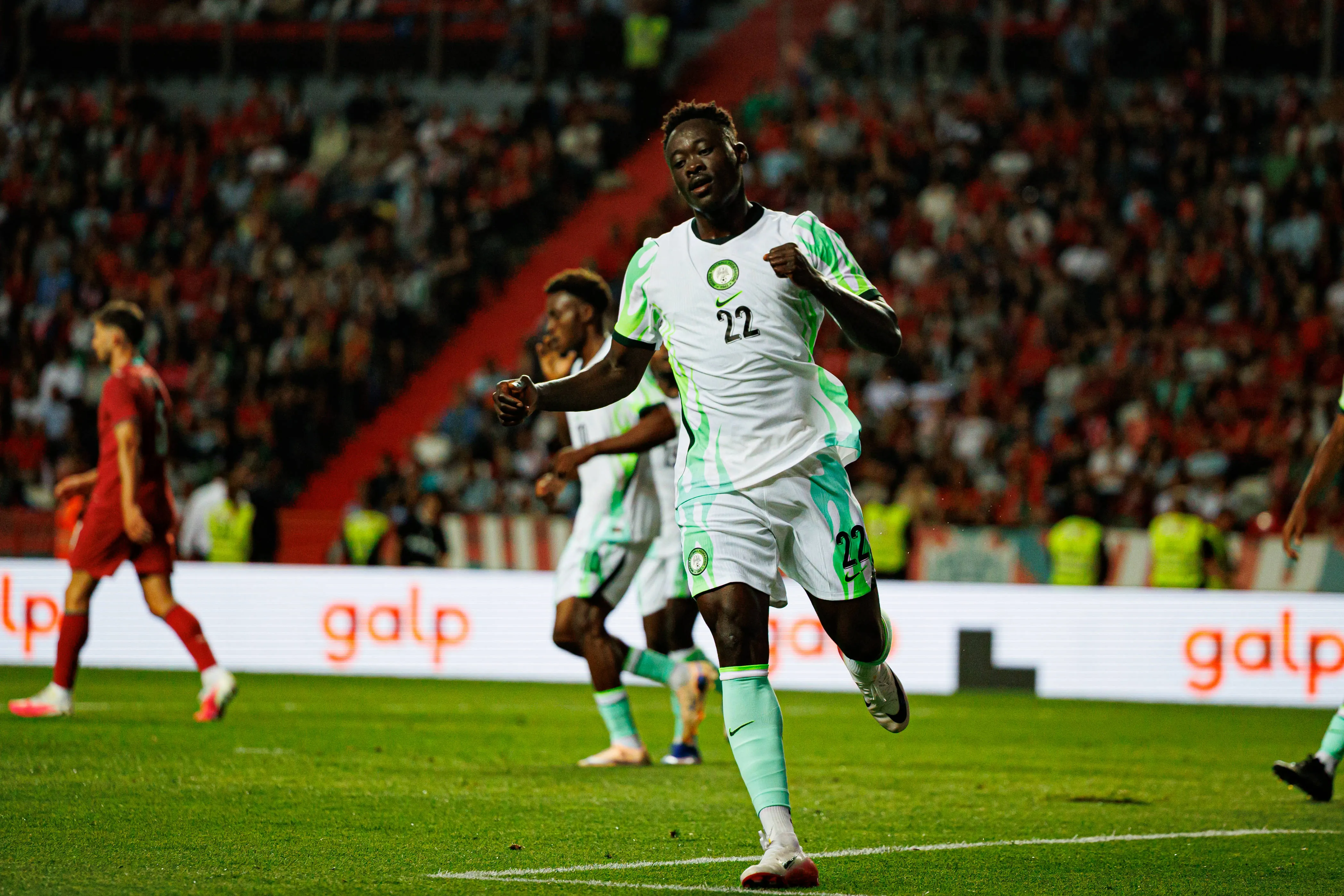 Akor Adams seen celebrating after scoring a goal against Portugal