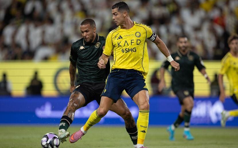 William Troost-Ekong marks Cristiano Ronaldo