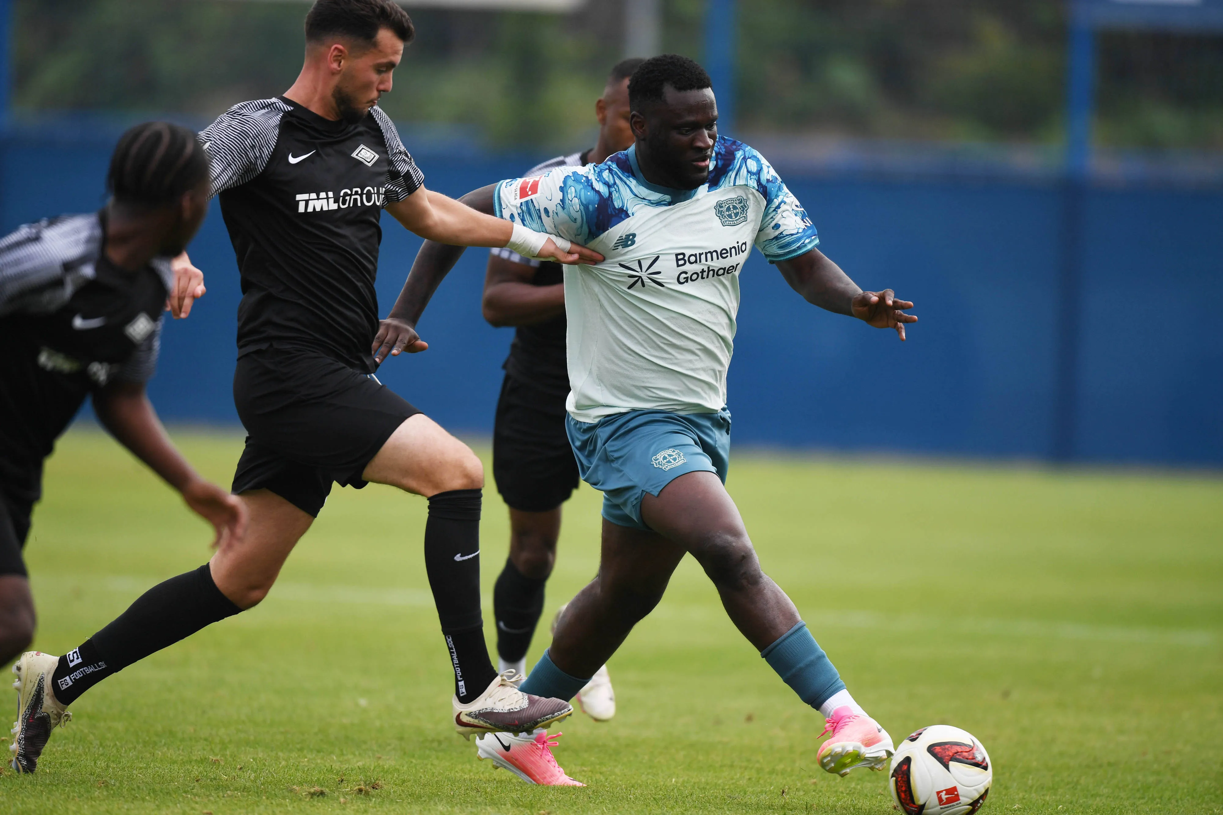 Friendly Match: SF Baumberg vs. Bayer 04 Leverkusen, Victor Boniface marked by opponents