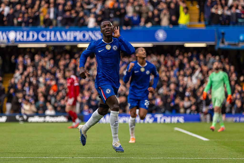 Moises Caicedo celebrates after scoring the opening goal during the English Premier League match between Chelsea FC and Liverpool FC in London