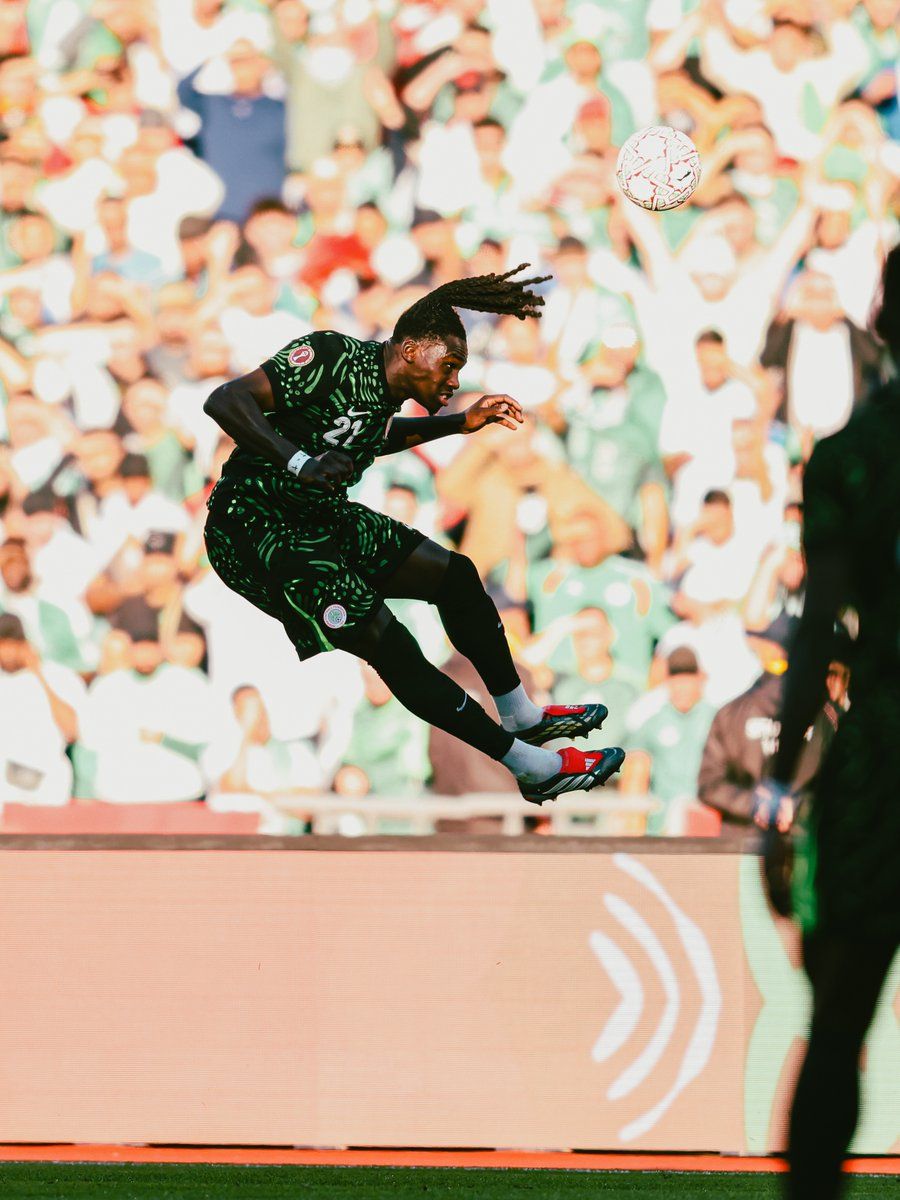 Calvin Bassey heads the ball for Super Eagles