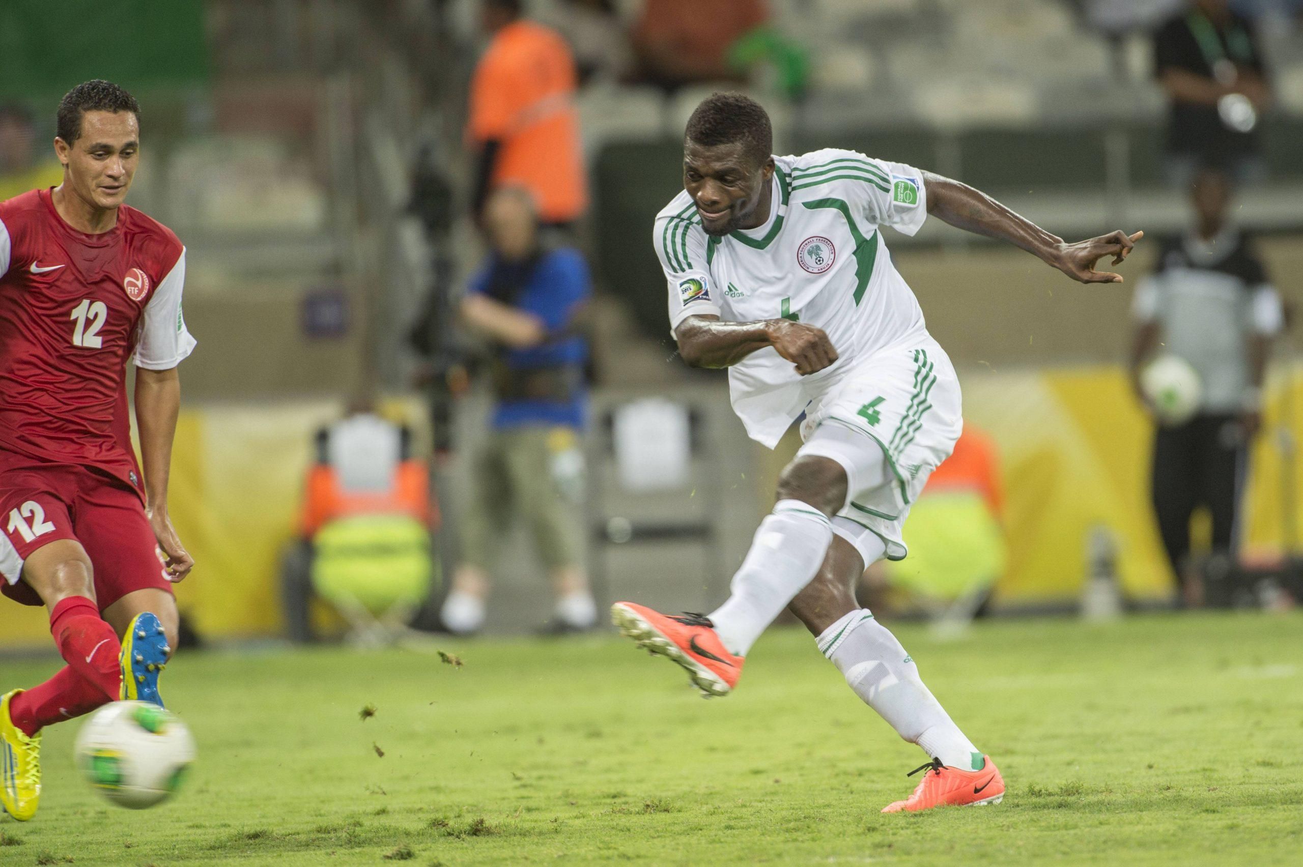 John Ogu NGR Edson Lemaire Tah in 2013 horizontal FIFA Confederations Cup Brazil 2013 Group B Tahiti 1 6 Nigeria 