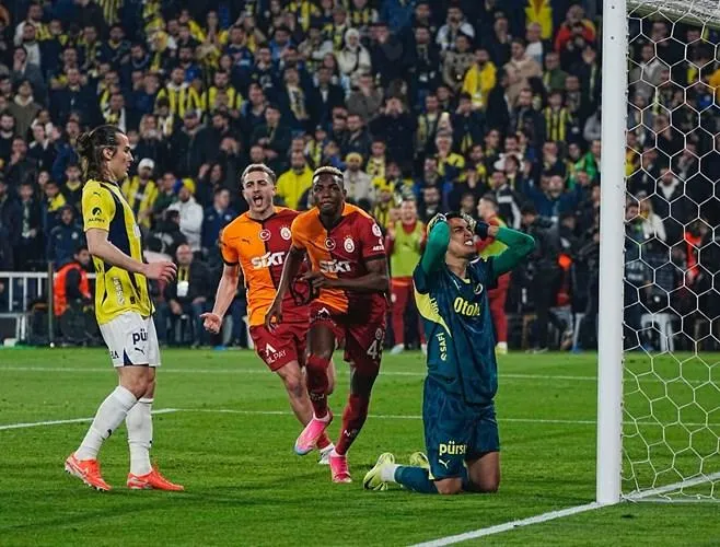 Victor Osimhen celebrates scoring against Fenerbahce. 