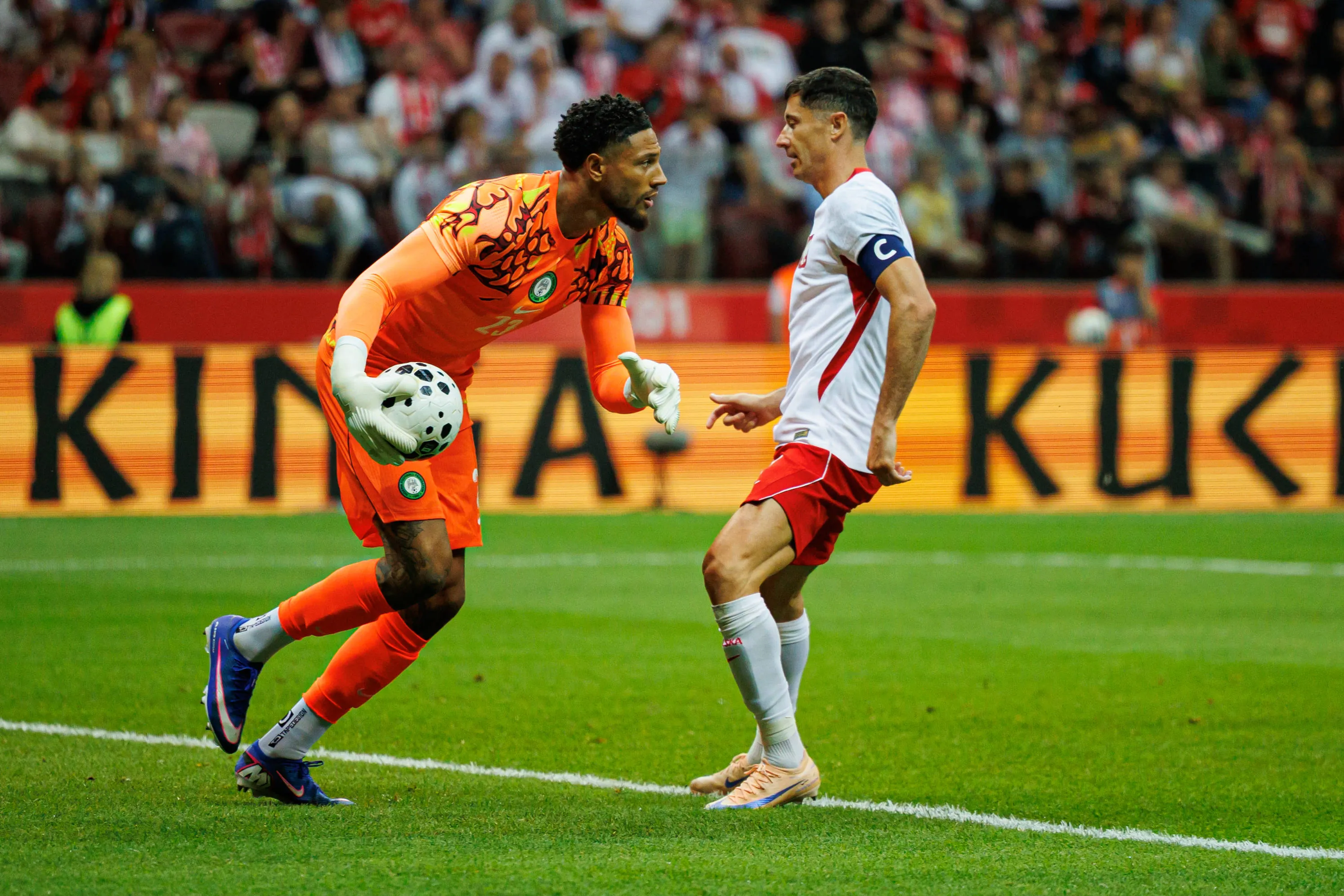 Maduka Okoye and Robert Lewandowski