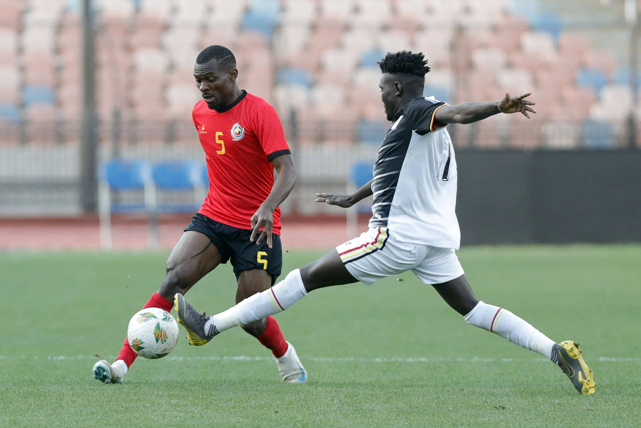 Bruno Langa L of Mozambique competes during the 2026 FIFA World Cup African qualifiers football match between Mozambique and Uganda