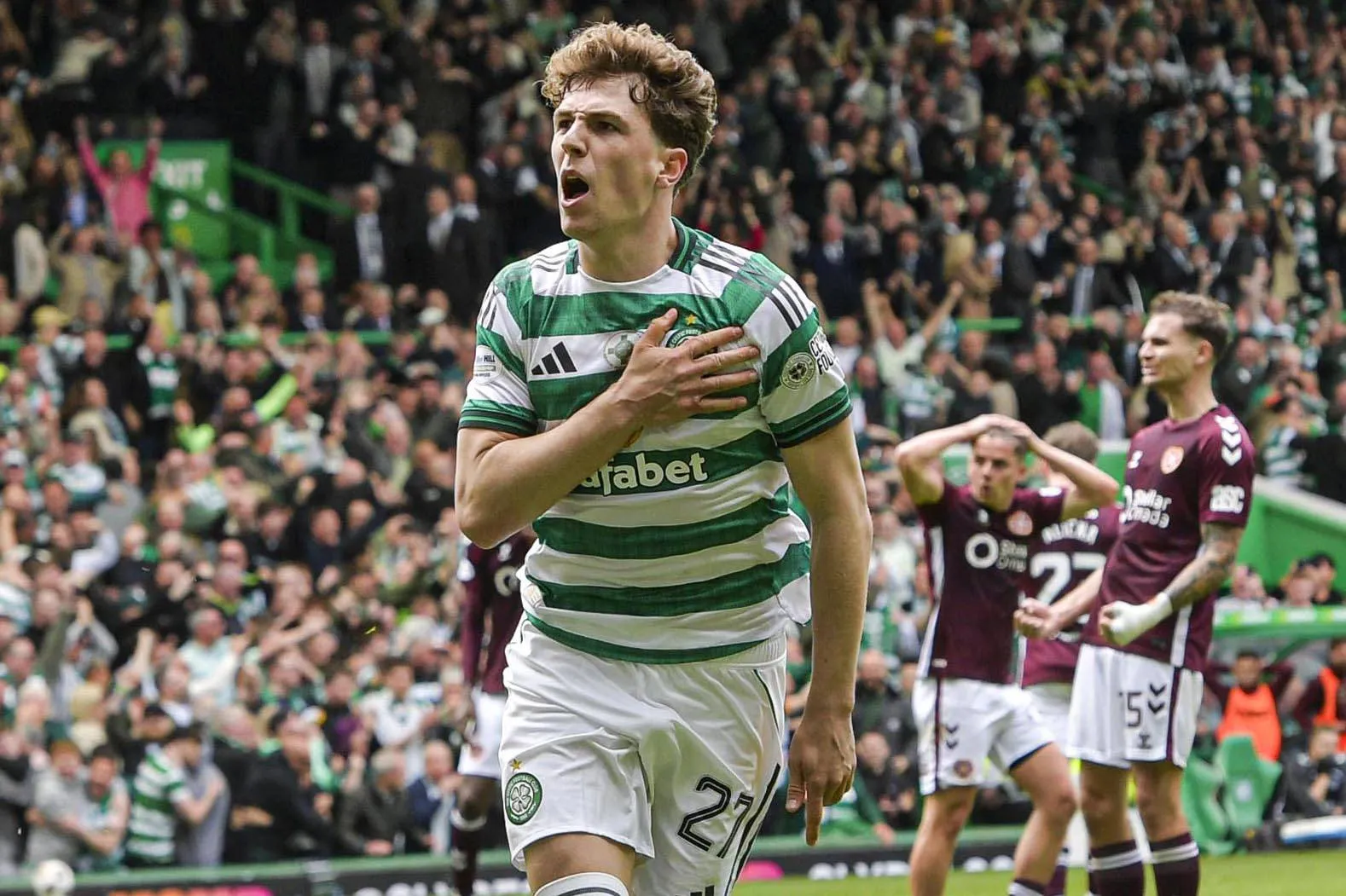 Arne Engels of Celtic scores his sides first goal of the match from the penalty spot and celebrates his goal