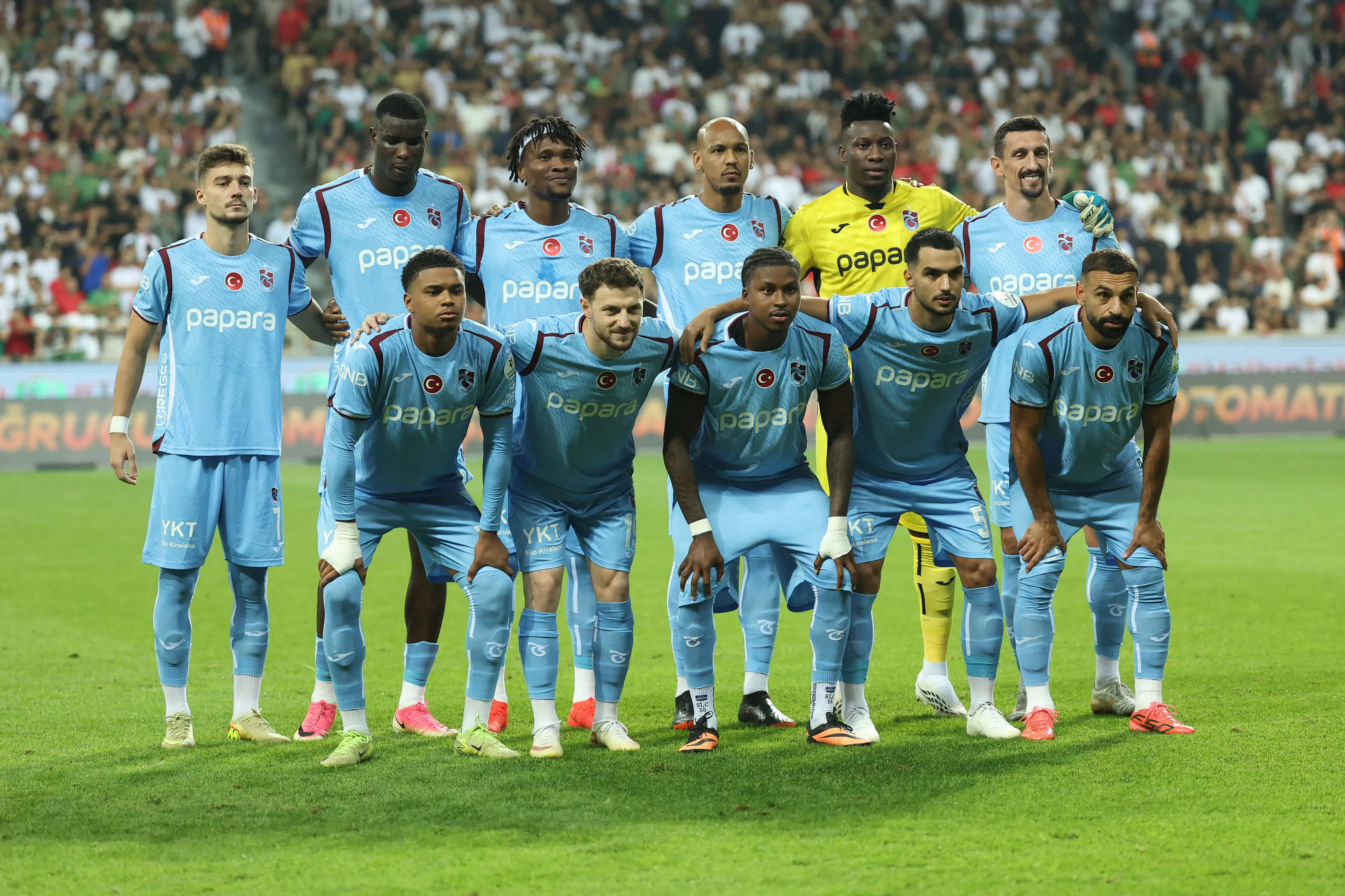 Players UP L-R , Ernest Muci , Paul Onuachu , Chibuike Nwaiwu , Fabinho , Goalkeeper Andre Onana and Stefan Savic , Down L-R Noah Saviolo , Mustafa Eskihellac , Sidny Lopes Cabral , Melih Kabasakal and Mohamed Salah of Trabzonspor poses a team photo for the 