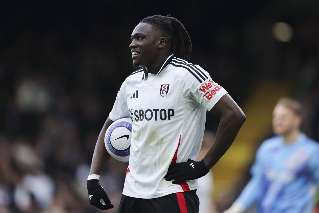 Calvin Bassey of Fulham holding the match ball