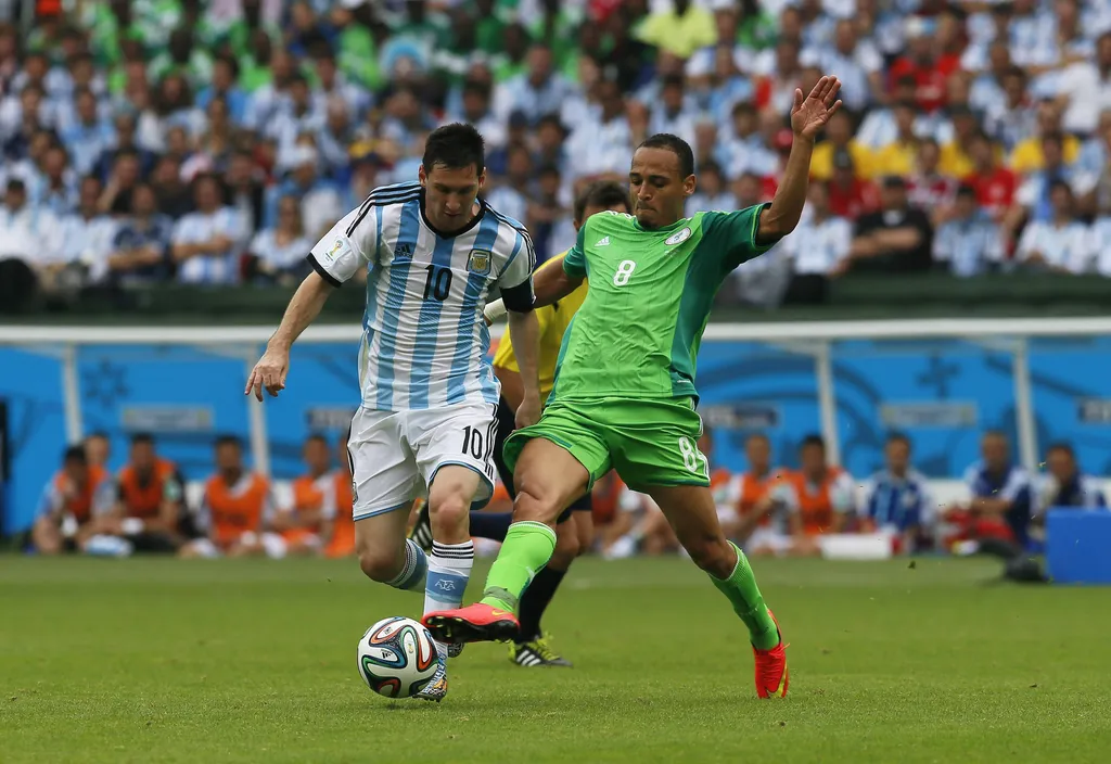 Lionel Messi and Peter Odemwingie