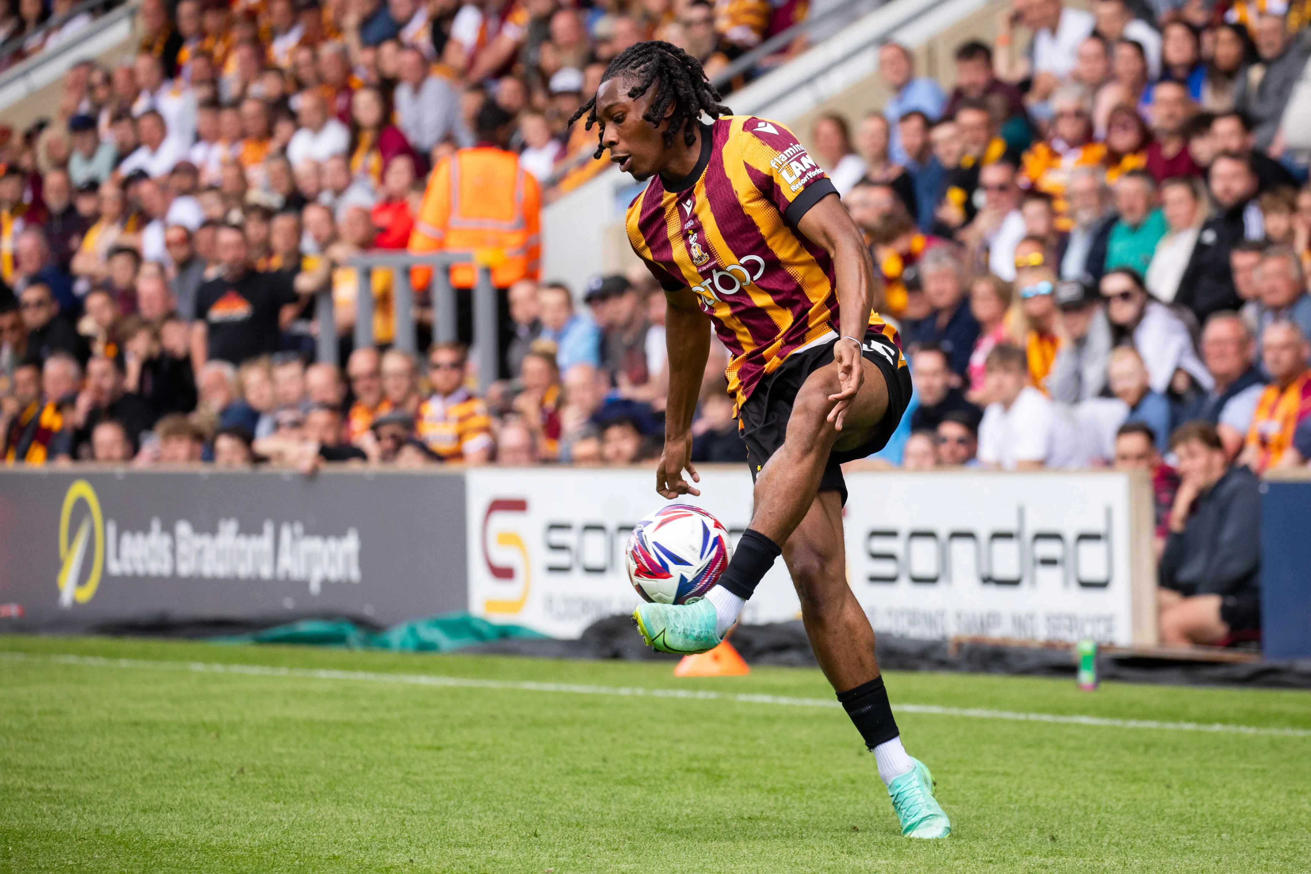 Tayo Adaramola in action during the SkyBet League Two game between Bradford City and Fleetwood Town