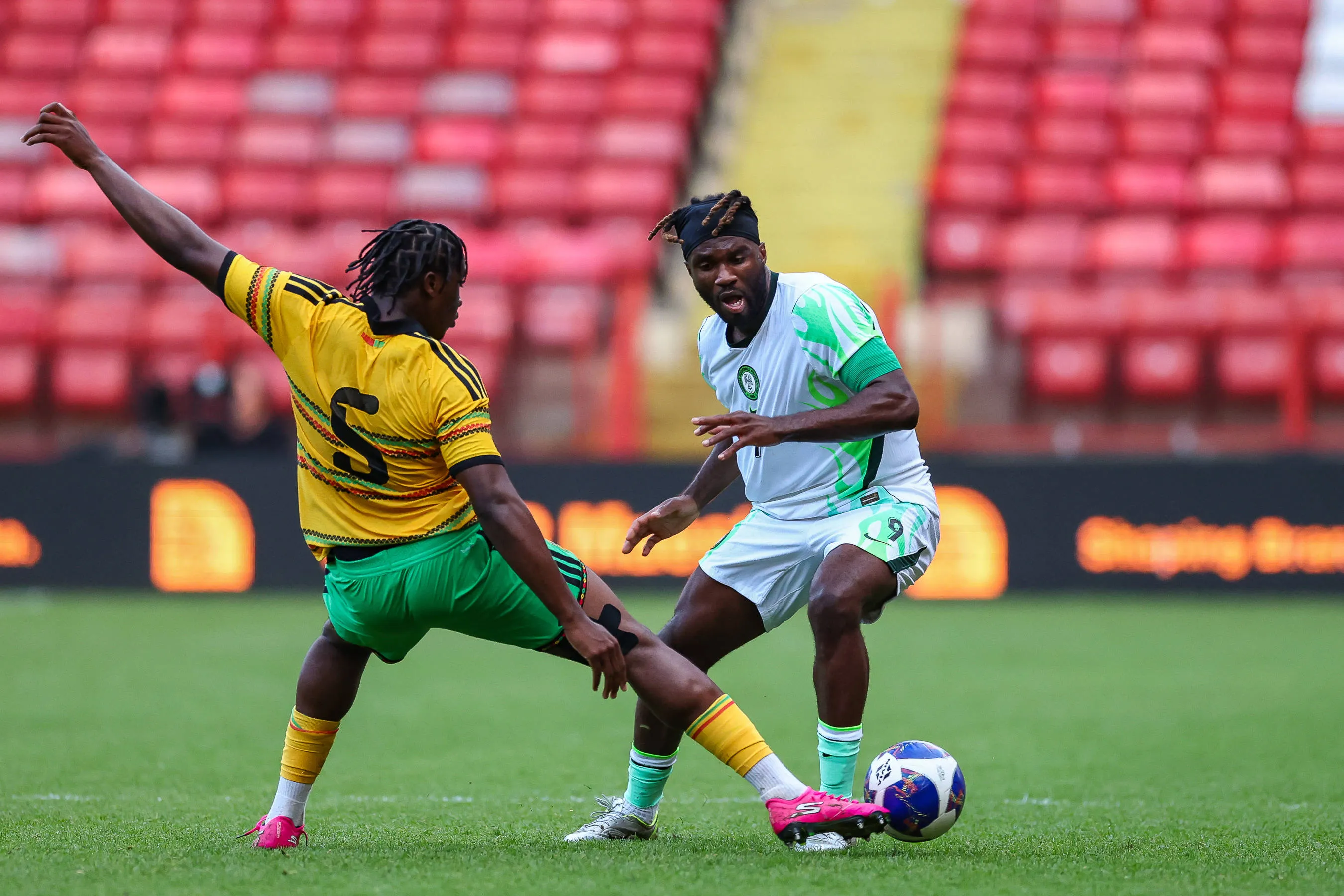 Jamaica midfielder Courtney Clarke and Super Eagles forward Terem Moffi