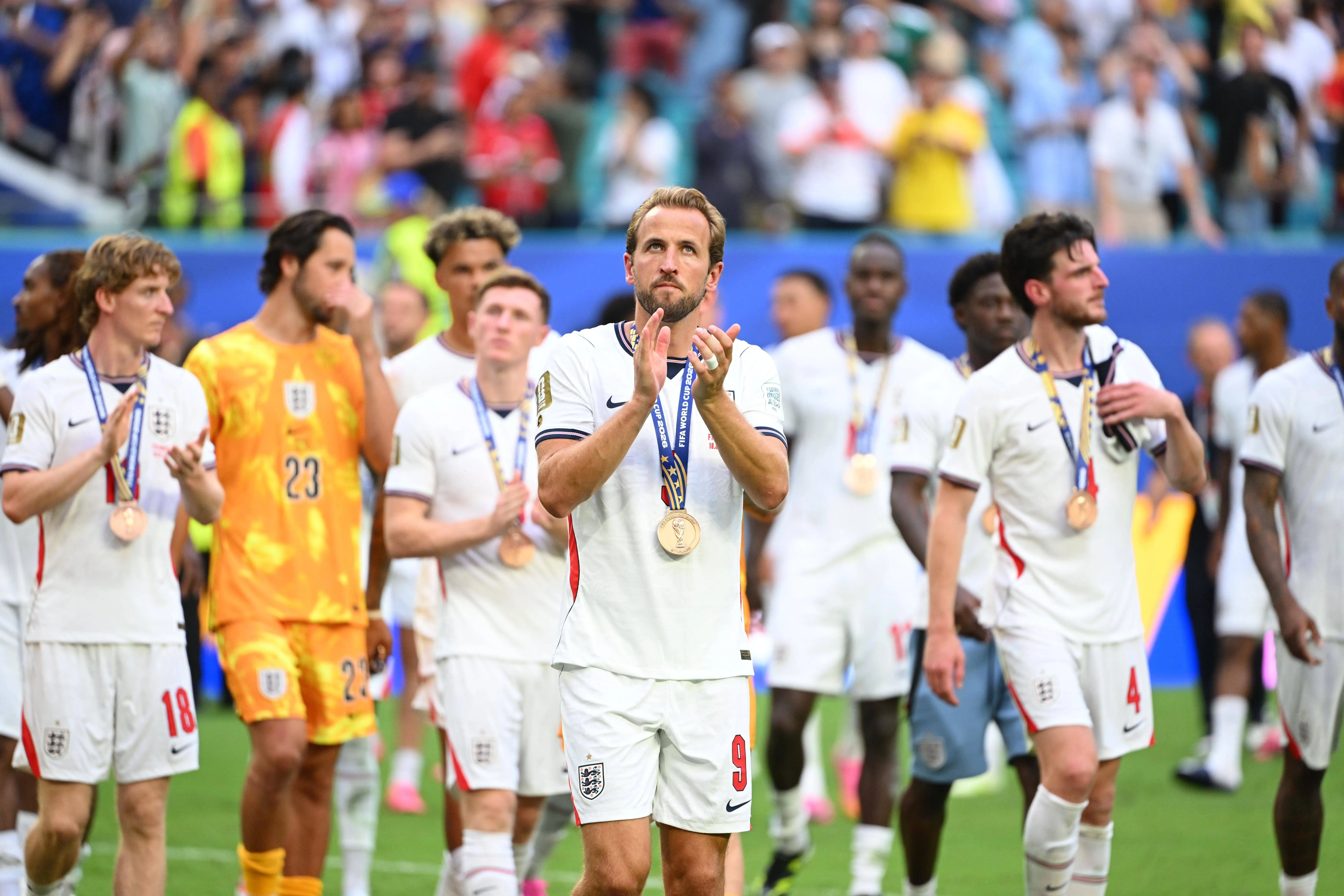 England team with Harry Kane leading.