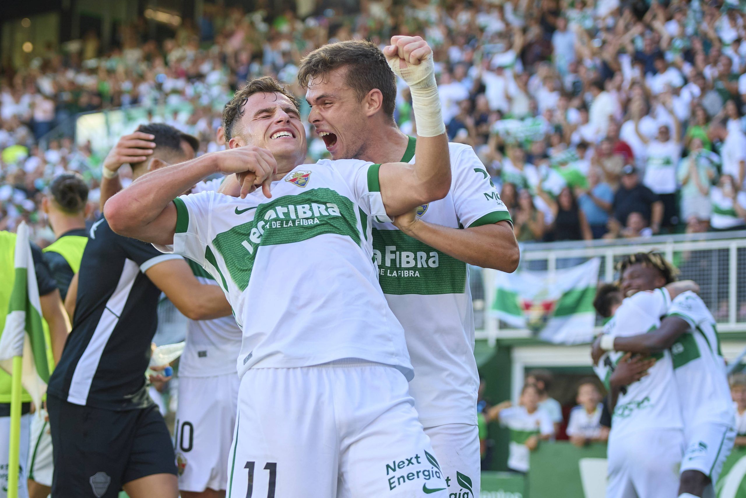 German Valera and Aleix Feibas celebrate after scoring during to the LaLiga match between Elche CF and RC Celta de Vigo