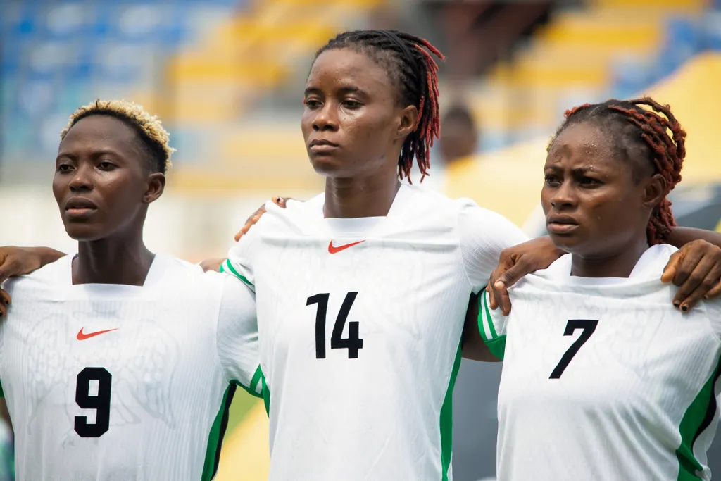 Ijamilusi Folashade Florence, Demehin Oluwatosin Blessing and Mathias Josephine in action for the Super Falcons of Nigeria