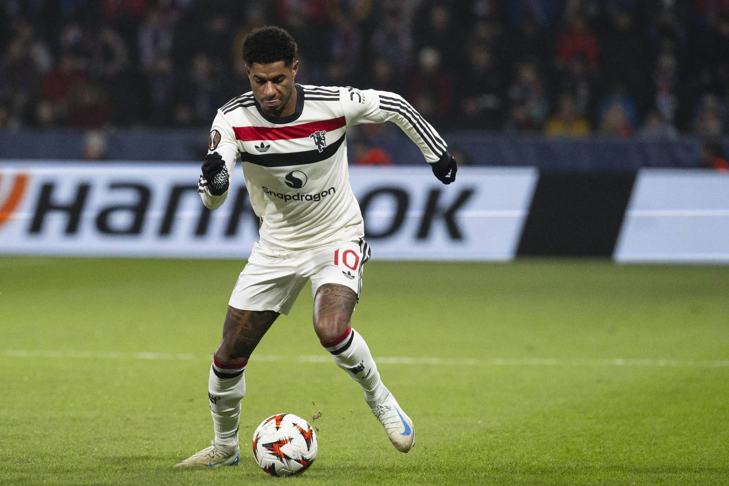 Image of Marcus Rashford in action for Manchester United running with the ball