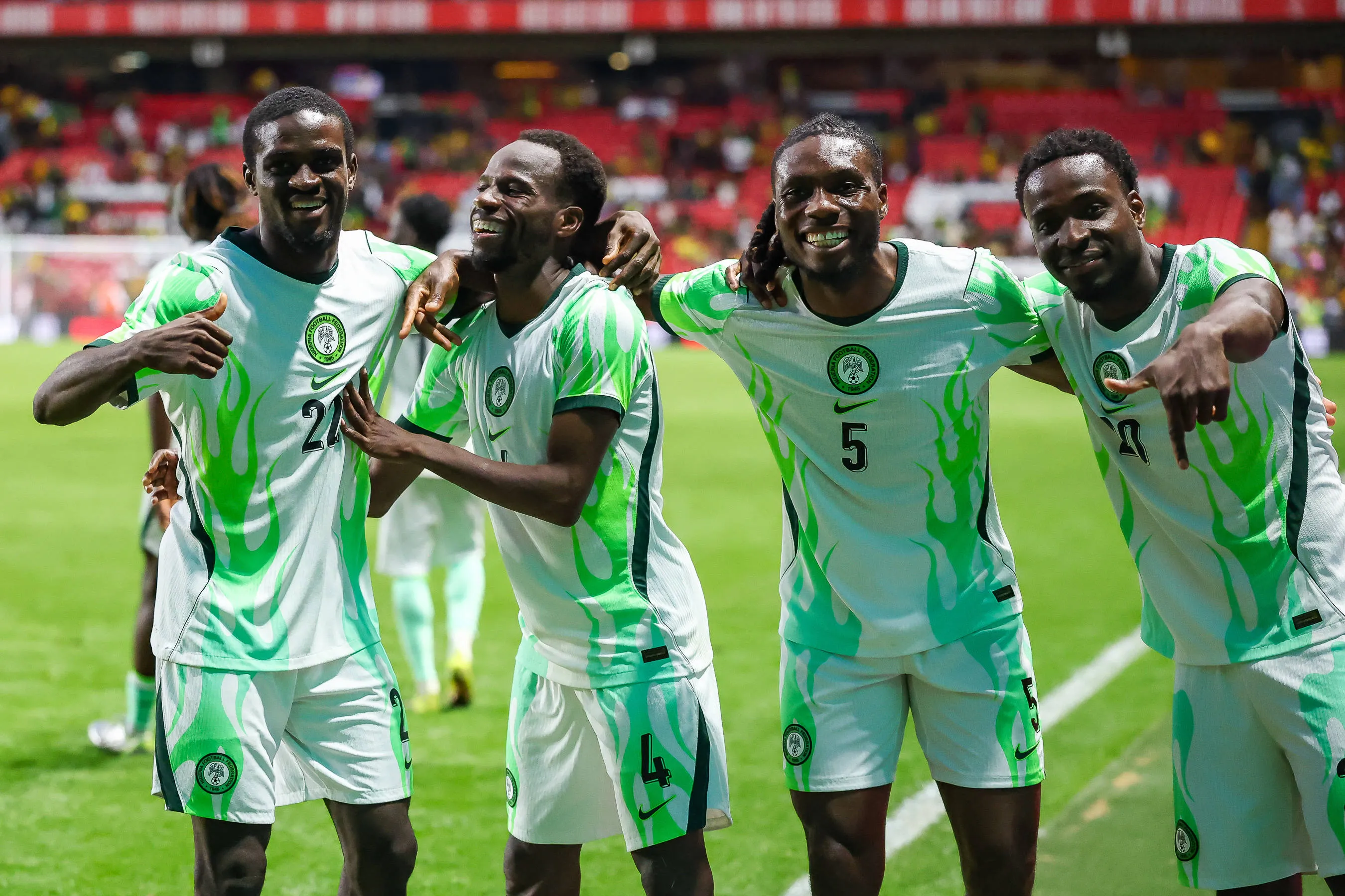Super Eagles midfielder Alhassan Yusuf celebrates with teammates