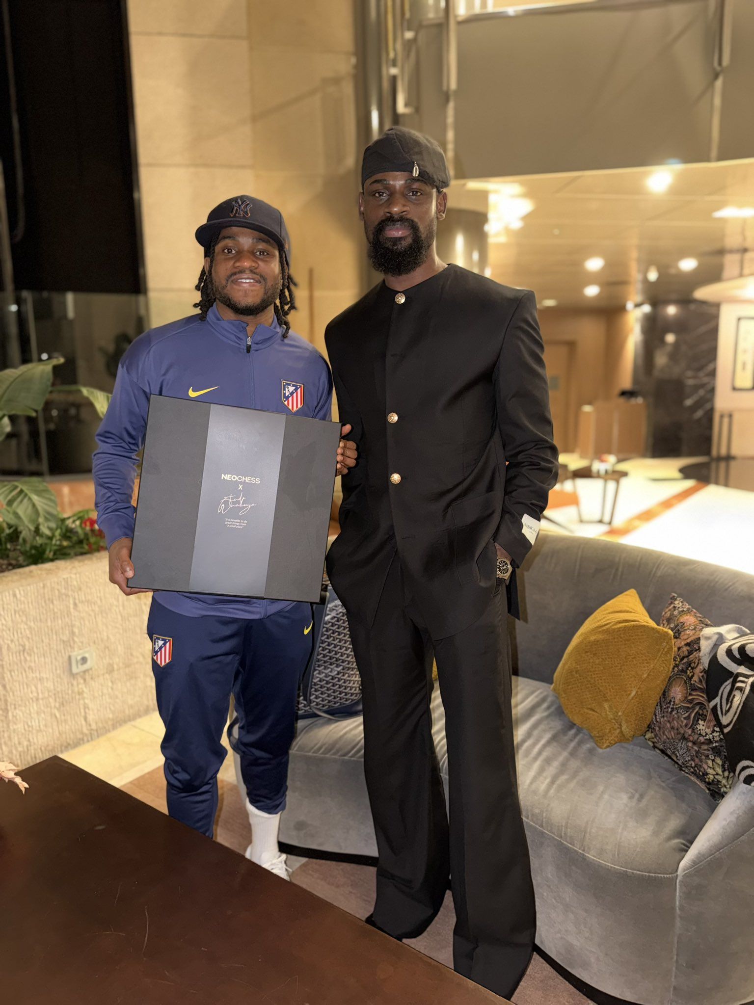 Ademola Lookman and Tunde Onakoya poses with chessboard