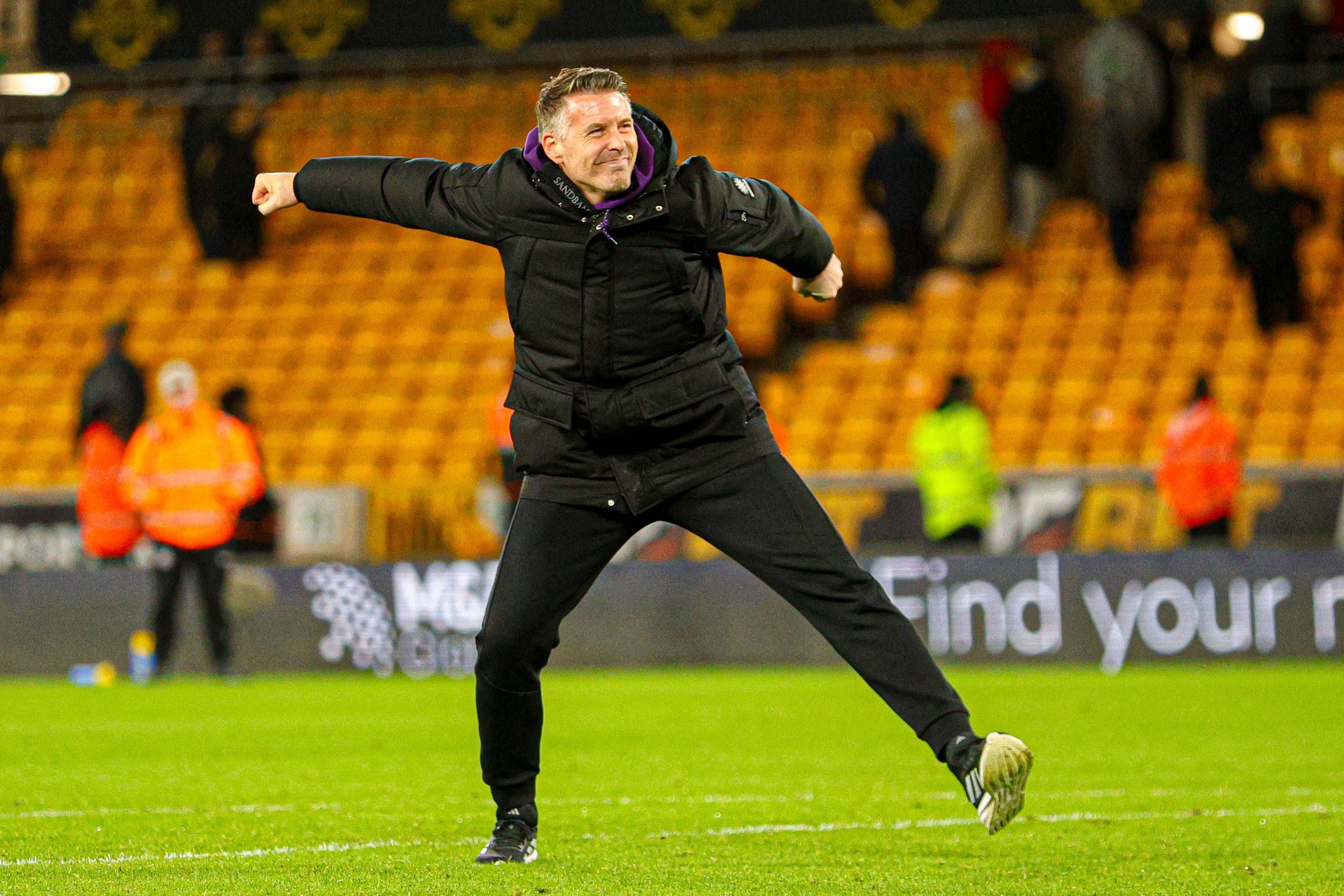 Manager Rob Edwards celebrates at full time of the Premier League football match between Wolverhampton Wanderers and Liverpool at Molineux stadium