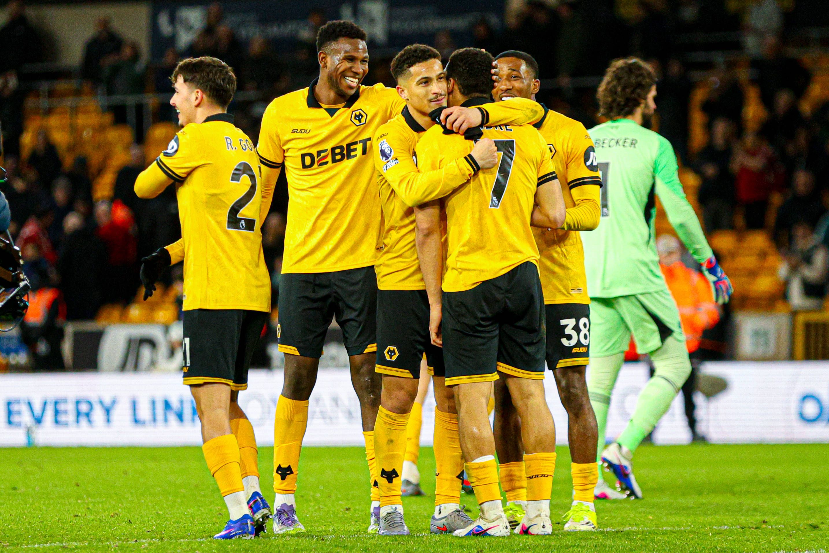 Wolves players celebrate at full time of the Premier League match against Liverpool
