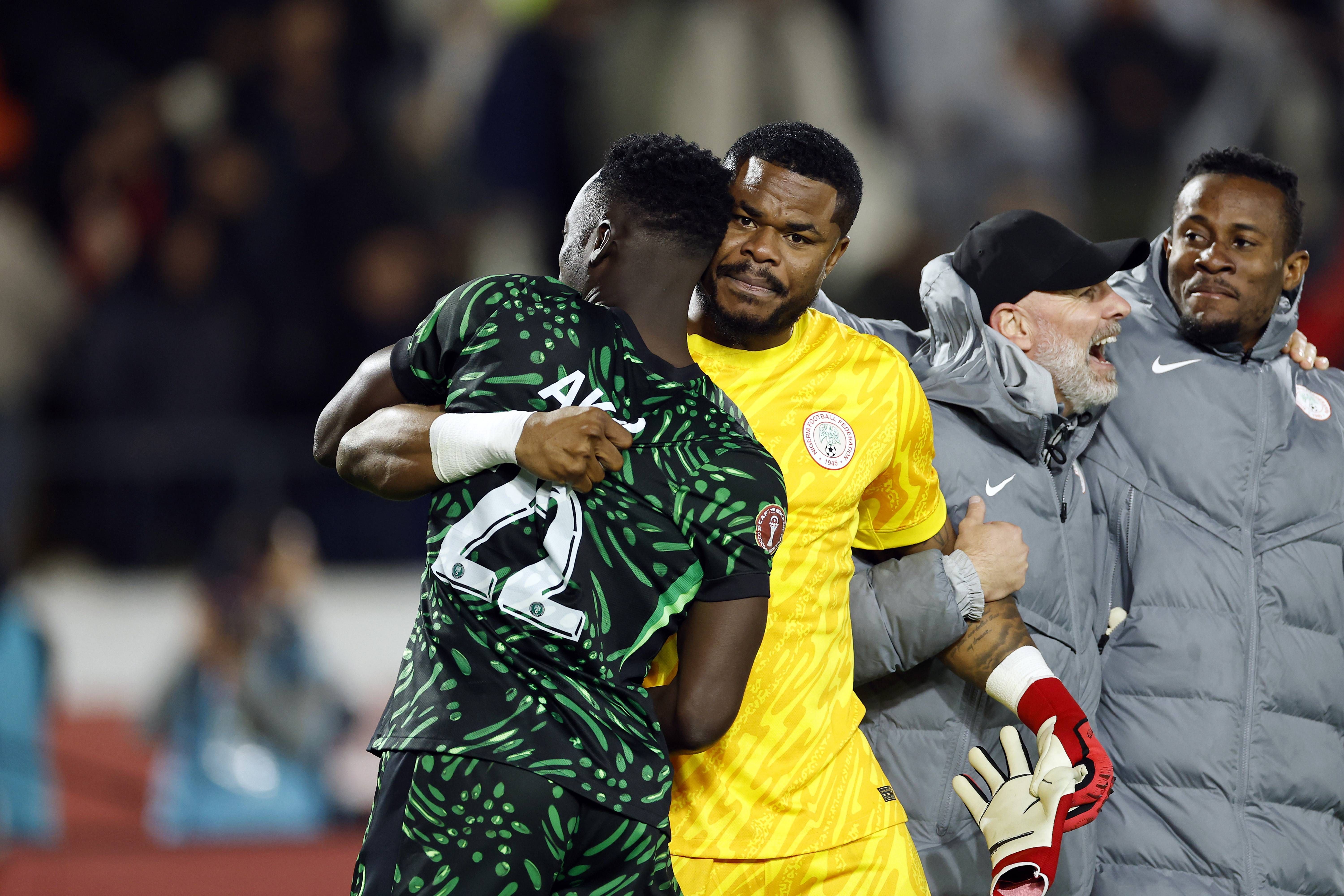 Akor Adams and goalkeeper Stanley Nwabali celebrates securing third place in the CAF Africa Cup of Nations