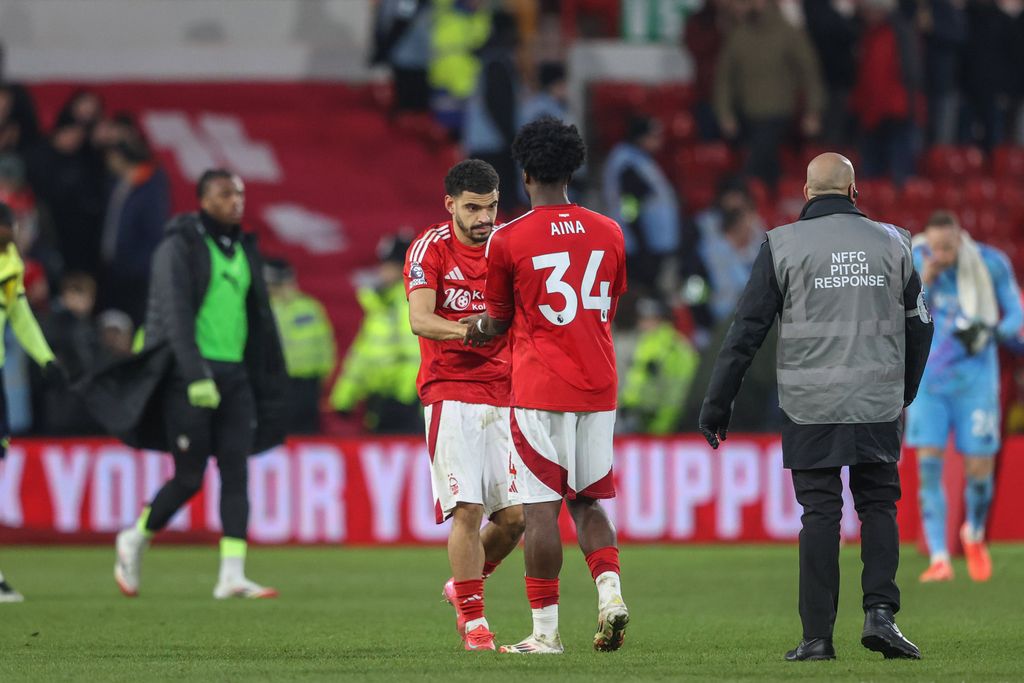 Morgan Gibbs-White celebrates the win with Ola Aina during the Premier League match, Nottingham Forest vs Southampton at City Ground.