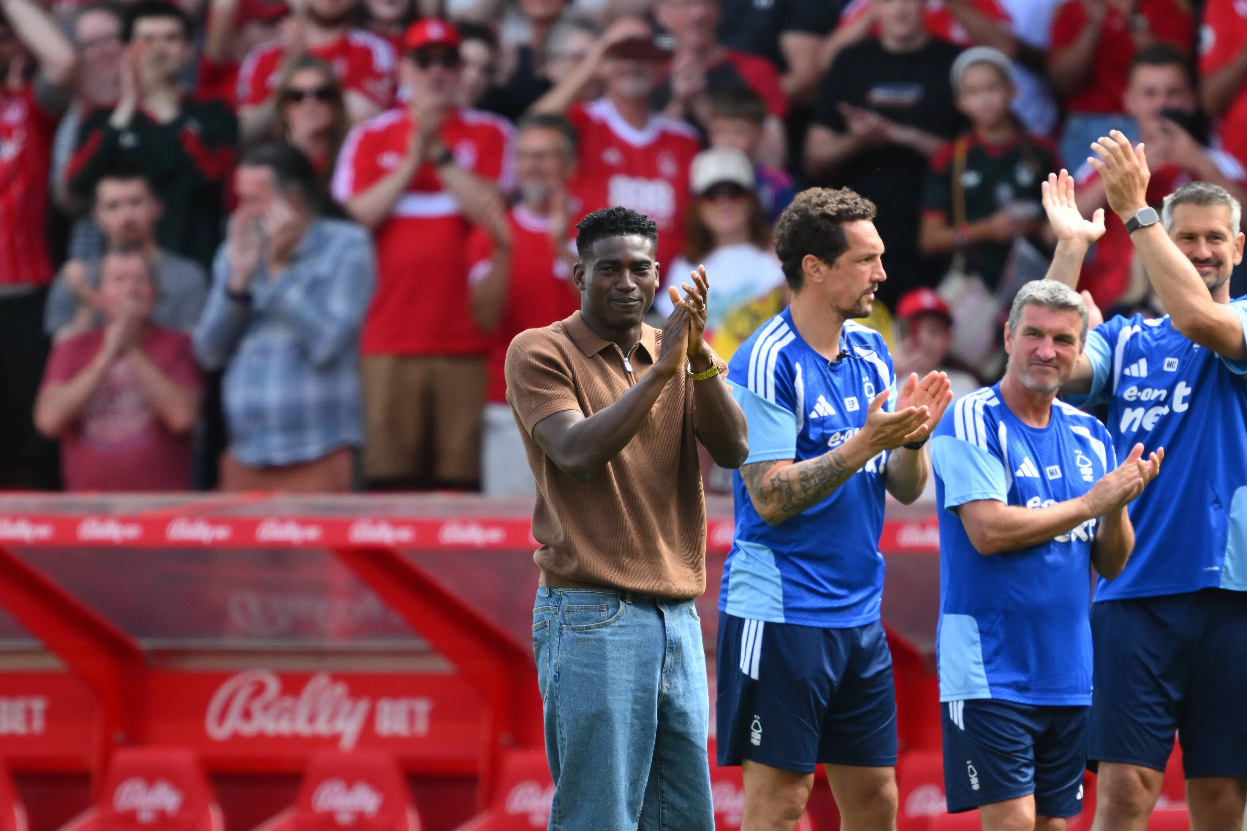 Taiwo Awoniyi of Nottingham Forest applauds supporters ahead of his transfer to Coventry City.