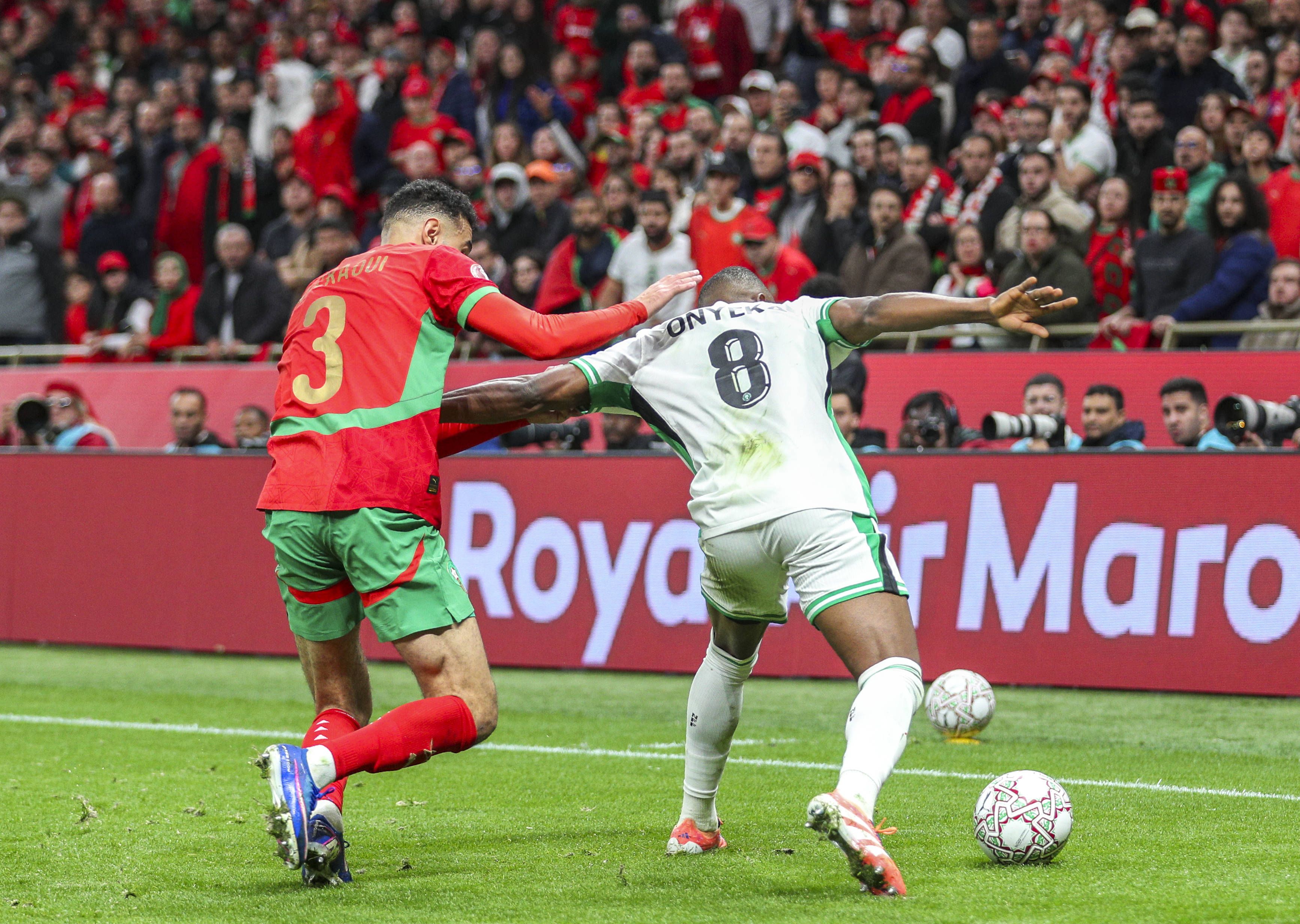 Noussair Mazraoui, Frank Onyeka in the AFCON semi-final match between Nigeria vs Morocco