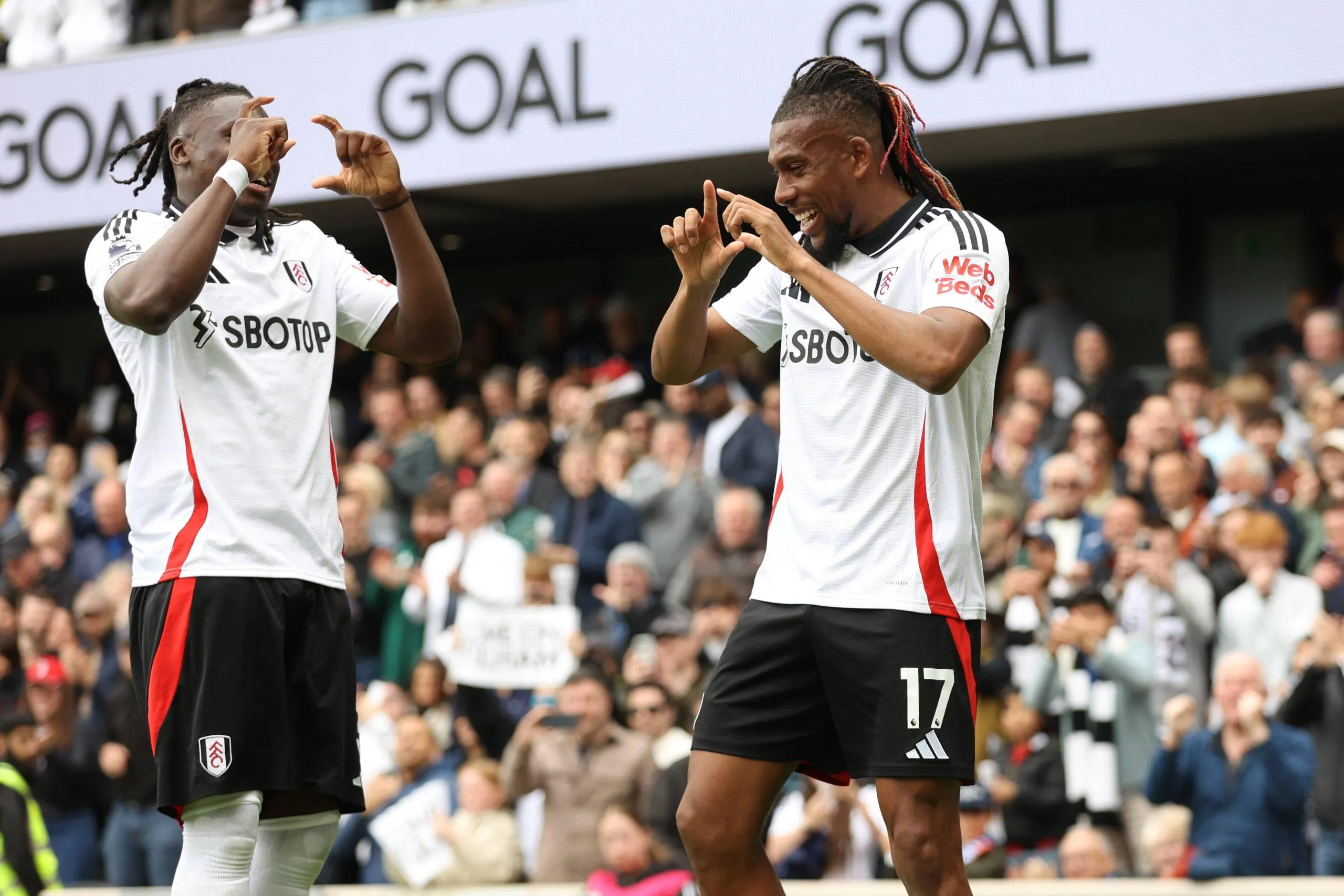 Calvin Bassey of Fulham and Alex Iwobi of Fulham goal celebrations