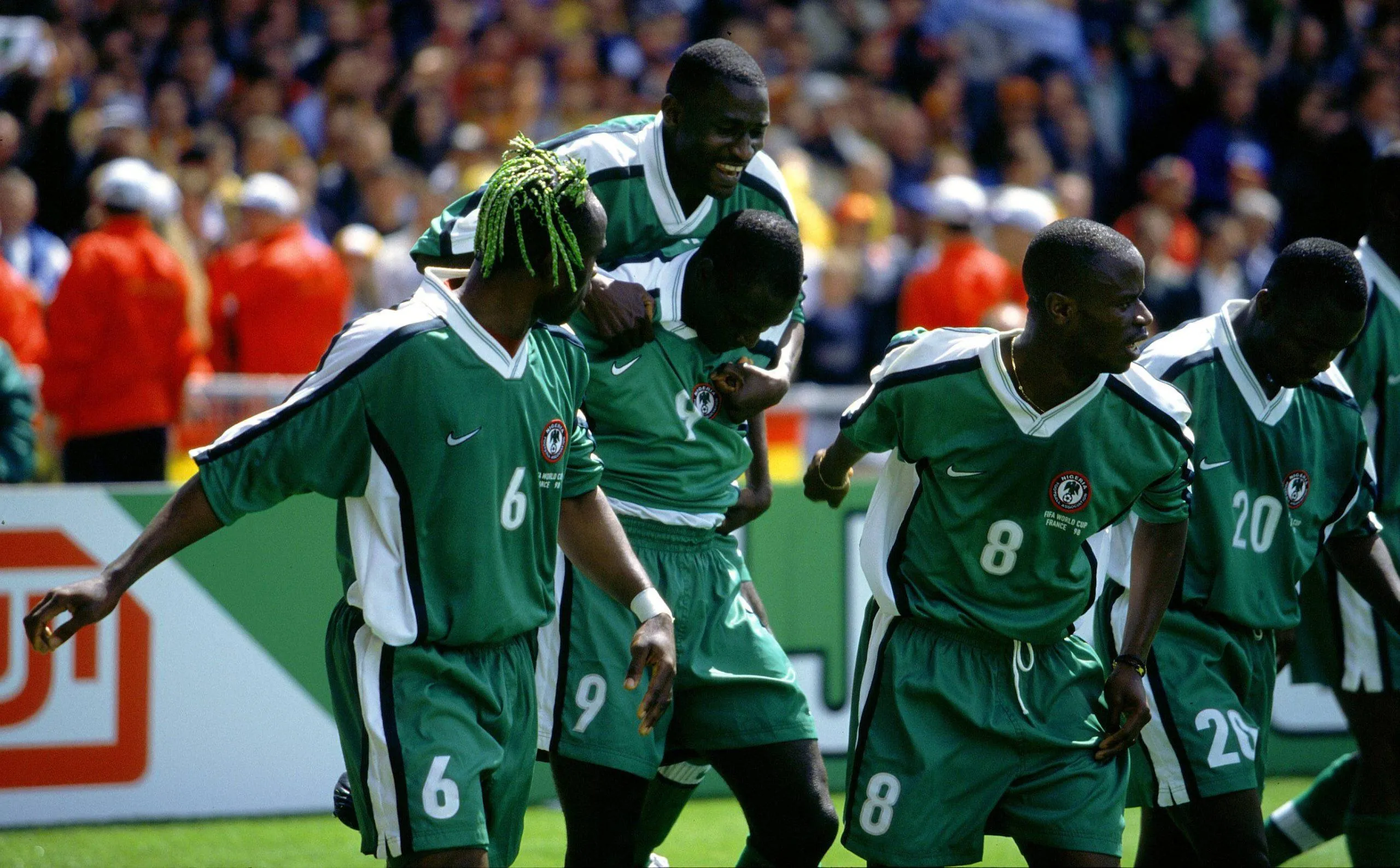 Super Eagles player celebrating with Rashidi Yekini