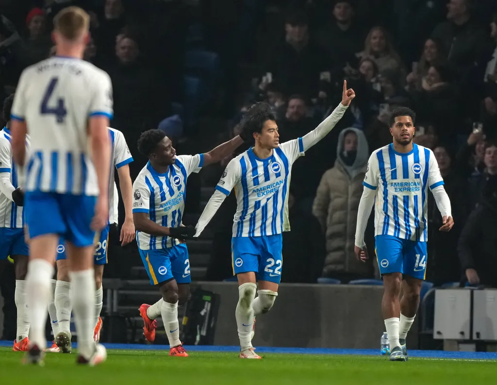 Brighton players celebrating scoring a goal