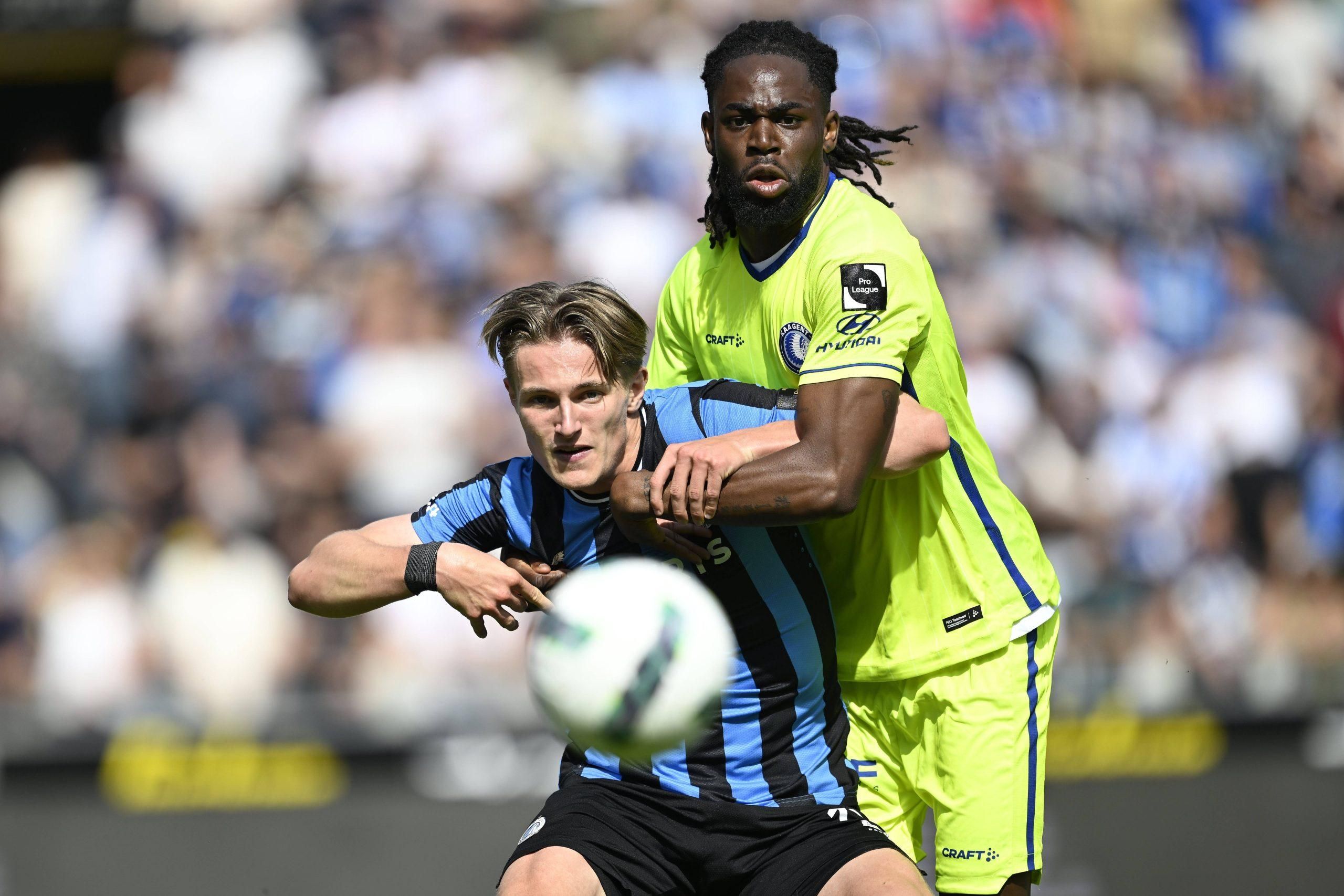 Vermant Romeo forward of Club Brugge is fighting for the ball with Jordan Torunarigha defender of KAA Gent