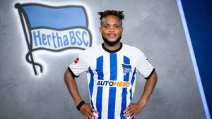 Ejuke in a Hertha Berlin shirt