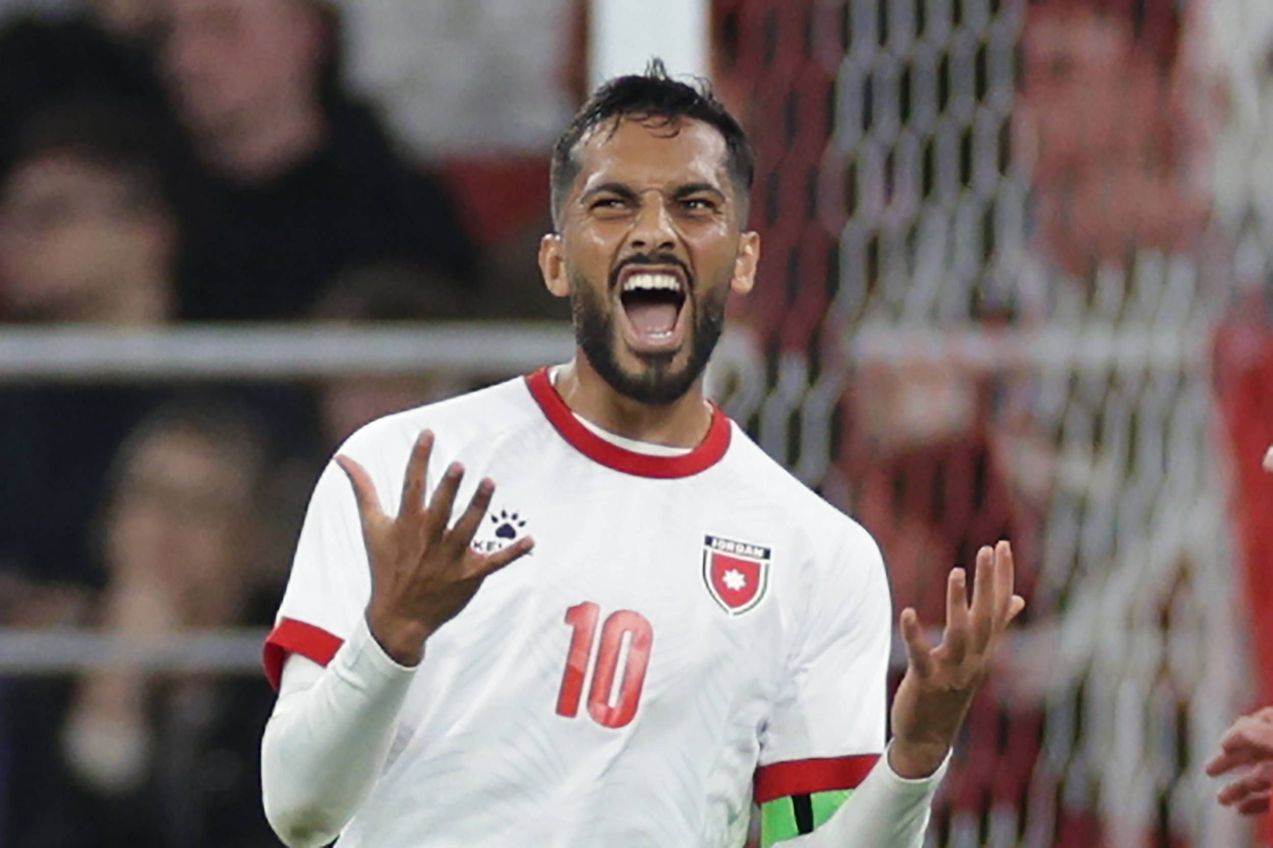 Musa Al Taamari celebrates goal for Jordan