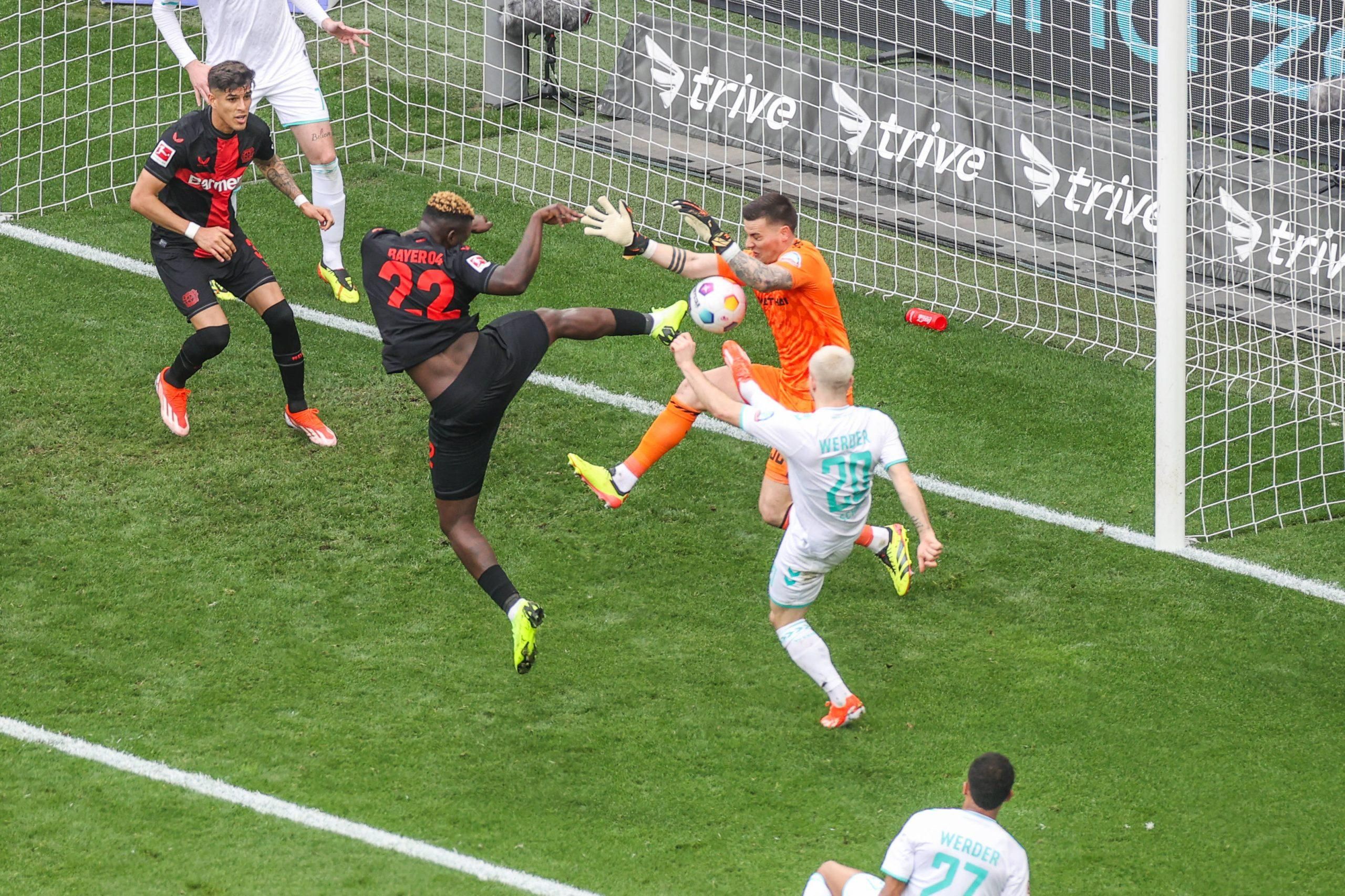 Victor Boniface and Michael Zetterer SV Werder Bremen , Romano Schmid SV Werder Bremen Leverkusen BayArena