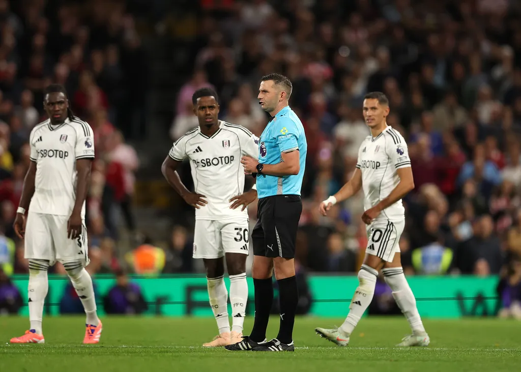 Referee Michael Oliver announces that Rodrigo Muniz of Fulham 4th goal in the 59th to make it 4-1 was later ruled no goal by VAR for an earlier foul